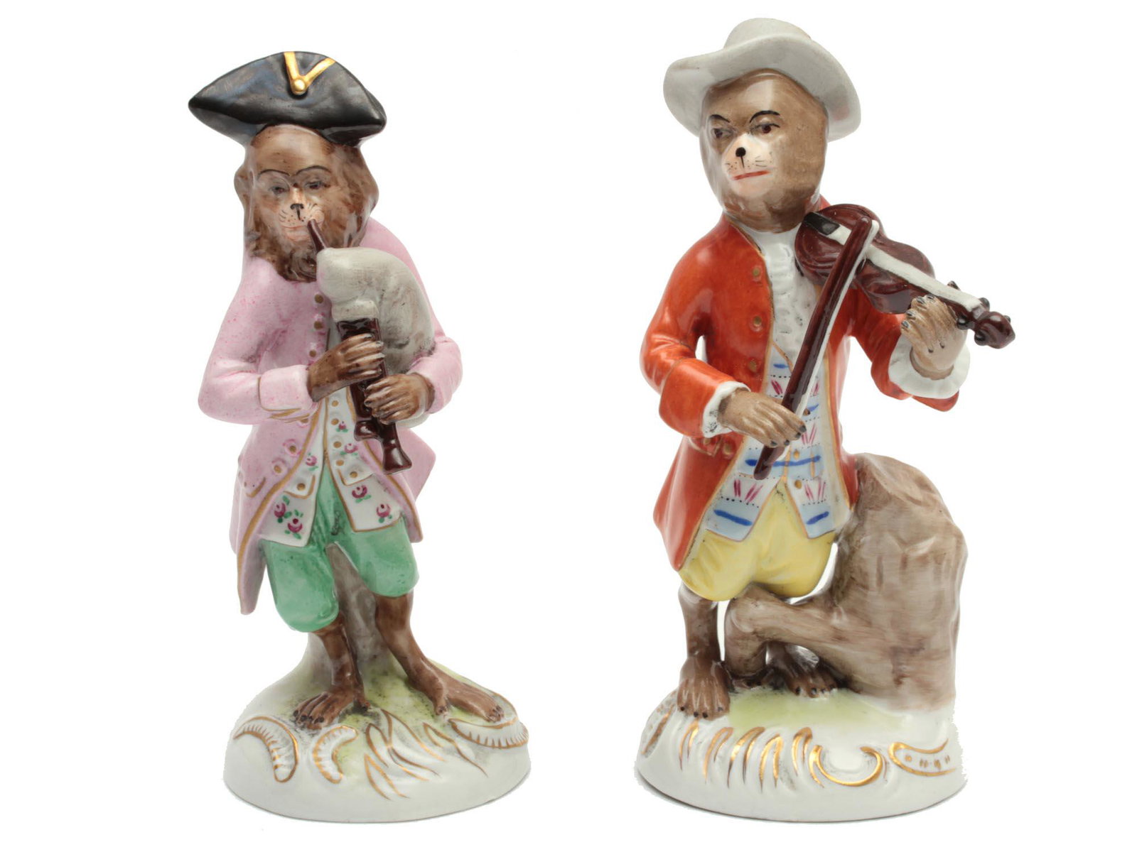 A PAIR OF VINTAGE KISTER&CO PORCELAIN FIGURINES: Two porcelain figurines from the Monkey Orchestra series. Hand painted, decorated with gilding. Numbered and marked on the base with the stamp of the manufacturer Kister & Co. (blue underglaze "S" cro