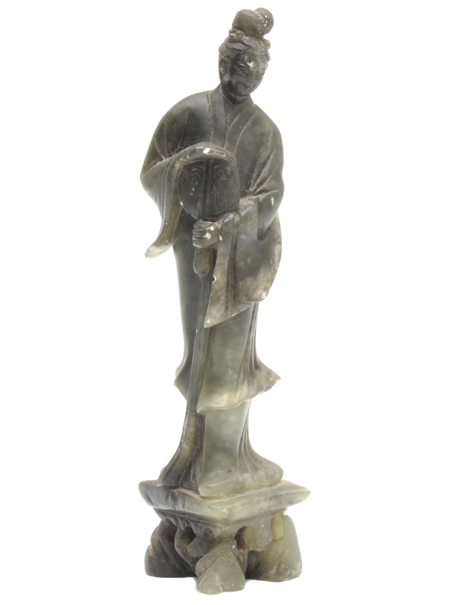 AN ANTIQUE CHINESE CARVED AGATE FIGURINE 19TH C: A Chinese carved agate figurine of a lady with a fan. The figurine has a beautiful texture of natural agate and transmits light in some places. Good condition with minor chips. Dimensions: H: 8 in., (