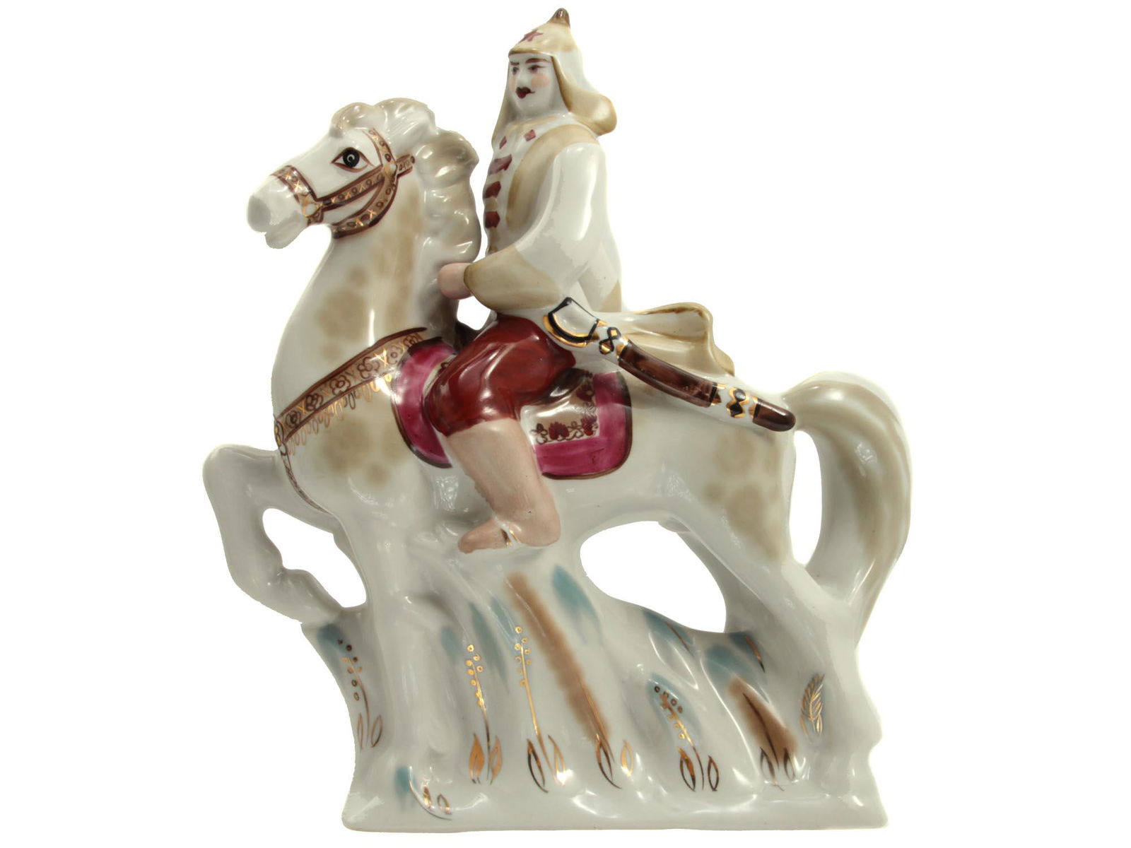 A RARE RUSSIAN SOVIET PORCELAIN FIGURINE: A vintage porcelain figurine â€œRed Army soldier. Budenovets on Horseback ", made during the Soviet era at the Polonsk Porcelain Factory. With a green factory stamp on the bottom. The figurine dec