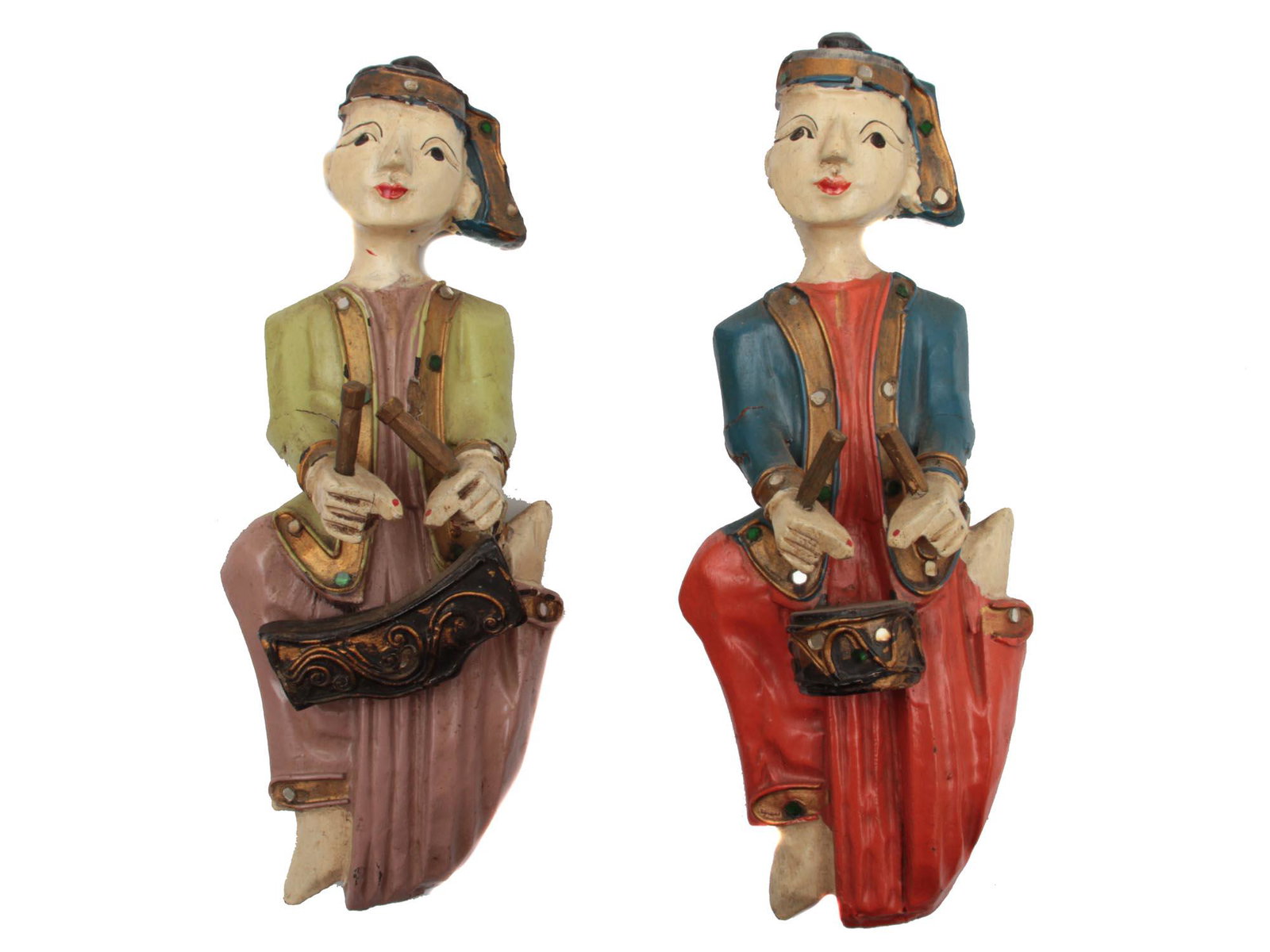 A PAIR OF VINTAGE THAI HAND-PAINTED WOODEN DOLLS: A pair of Thai wooden hand-painted musician dolls. There is a metal hanging ring on the back. Dimensions: H: 9 1/2 in., (24 cm.)