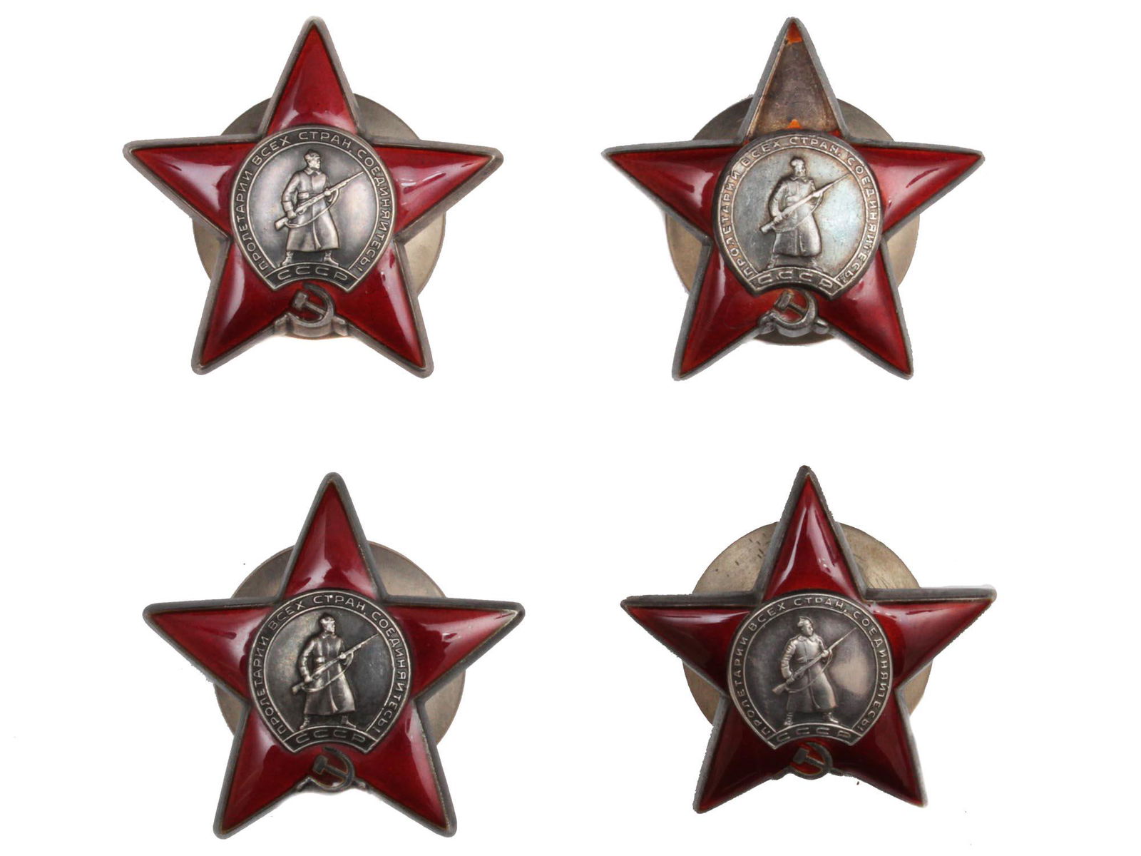 A LOT OF FOUR SOVIET WWII ORDERS: This lot includes 4 "Order of the Red Star" Russian medals. The Order of the Red Star was a military decoration of the Soviet Union. It was established by decree of the Presidium of the Supreme Soviet