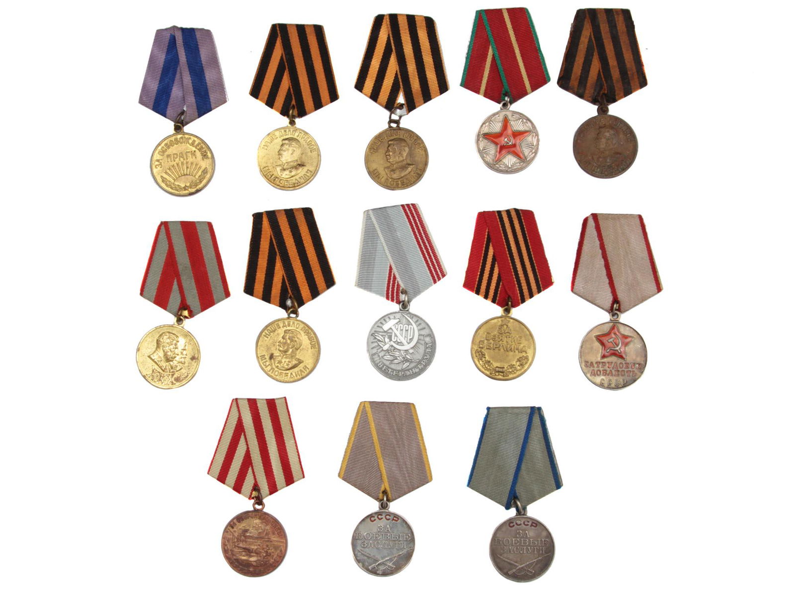 A LOT OF 13 RUSSIAN SOVIET MEDALS WWII TIME: This lot includes the medals: "For Liberation of Prague," "For Victory over Germany in the Great Patriotic War 1941-1945," (x4) "For Impeccable Service" 1st Class, "30 Years of the Soviet Army and Nav