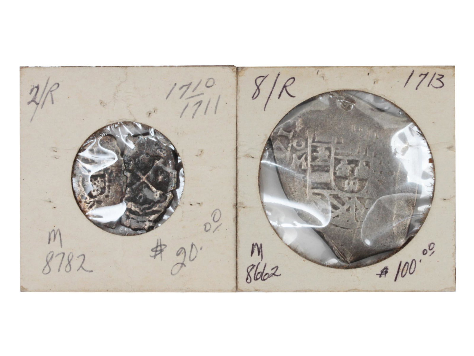 A TWO ANTIQUE MEXICO SILVER REALES COIN: This lot includes: Spain colony Mexico silver 8 reales coin 1713 and one Spain colony Mexico silver 2 reales coin 1710-1711.Total weight: 31.5 g Dimensions: Various dimensions
