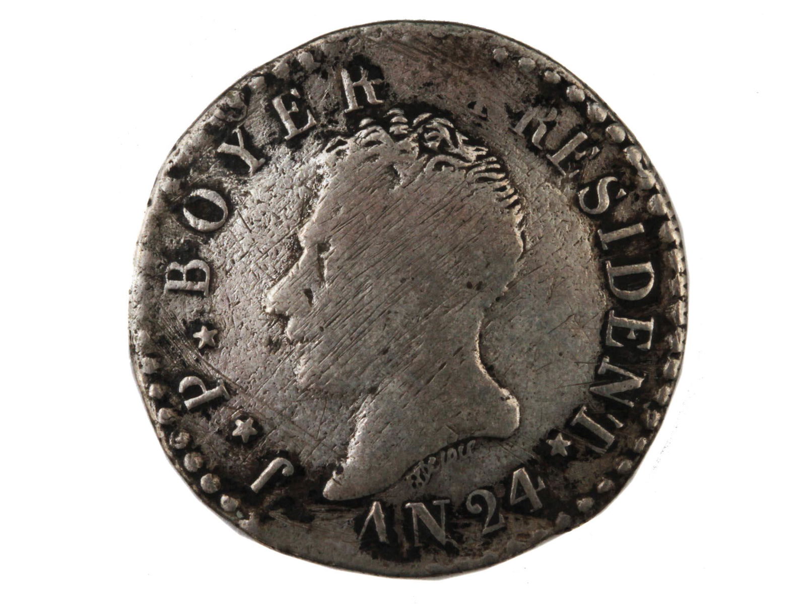 AN ANTIQUE HAITIAN SILVER COIN: This is a very rare Haitian 50 centimes silver coin, AN24, circa: 1828.Weight: 5.2 Dimensions: D:1 in.