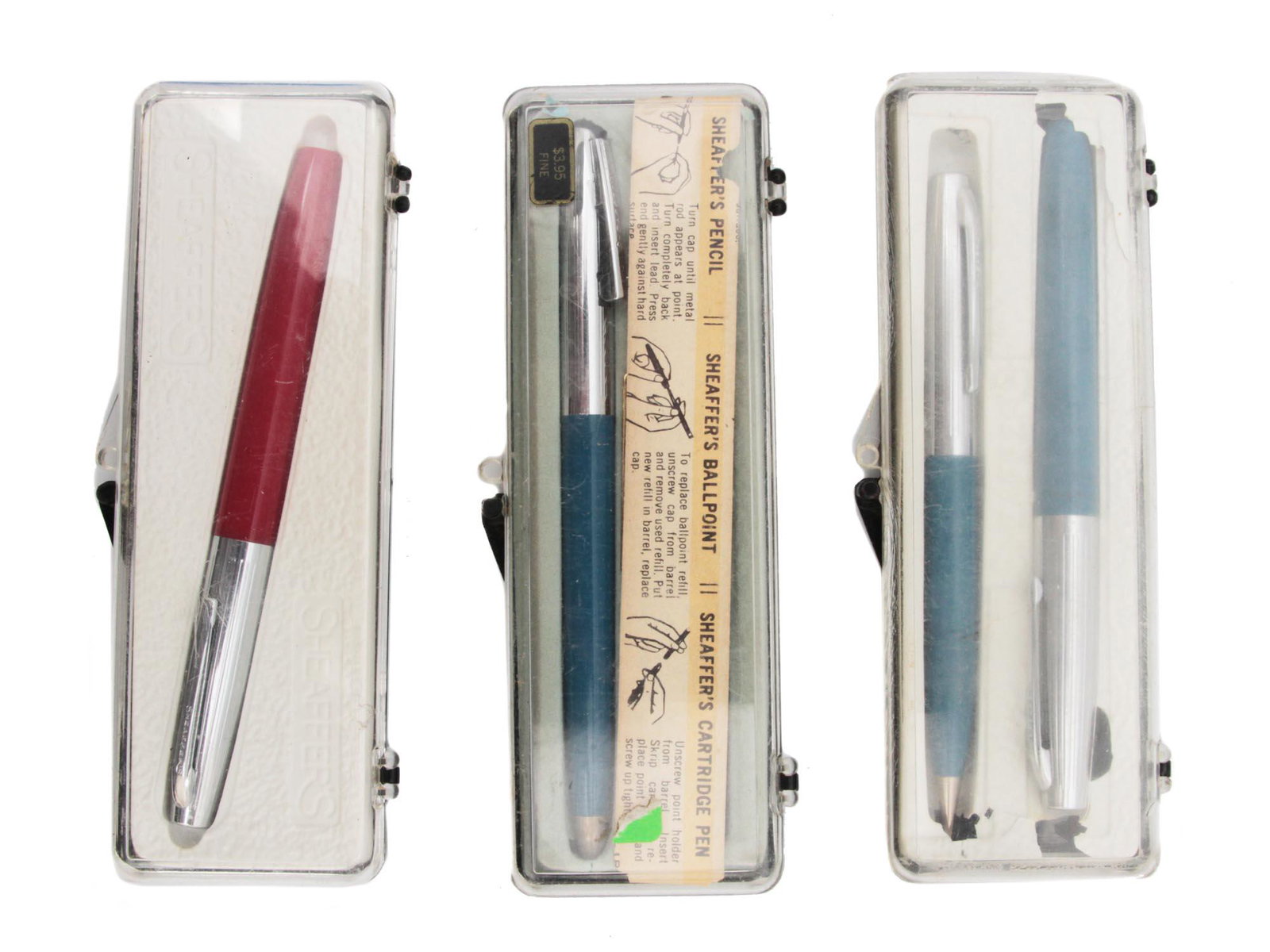 A LOT OF THREE SHEAFFER PENS IN ORIGINAL BOXES: A lot of three vintage Sheaffer pen. First: is a single fountain pen. Second: set of two pencil and ballpoint pen. Third: set of two pencil and cartridge pen. Dimensions: Smallest: 4 7/8 in.Largest: 5
