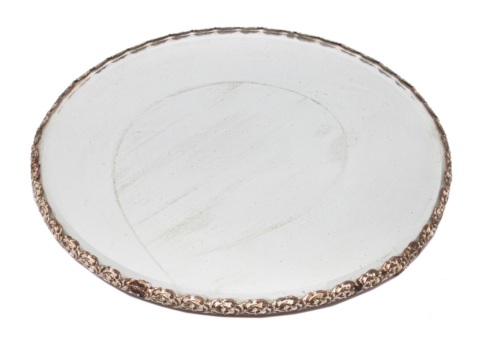 AN ANTIQUE VICTORIAN VANITY MIRROR: A round vanity mirror on legs, in Victorian style. Dimensions: D: 12 in.