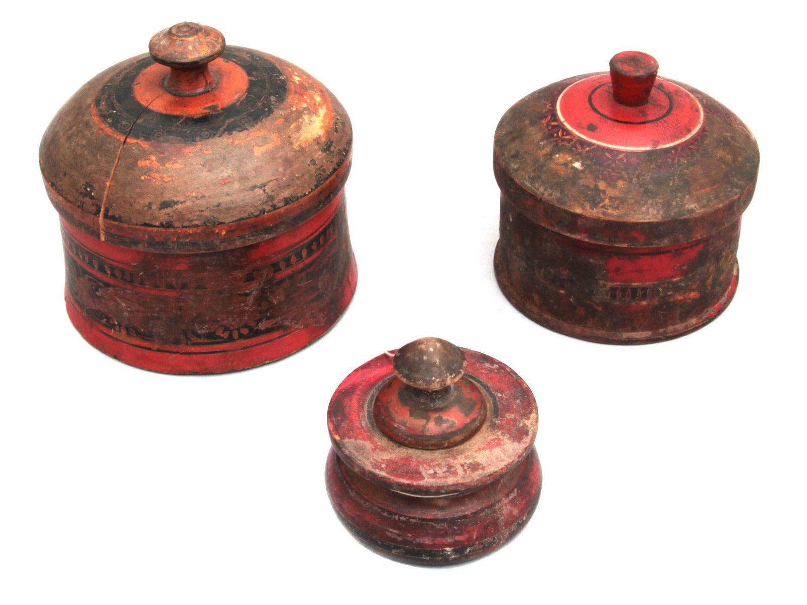 Set of 3 Wooden Spice containers Sindh, Pakistan: Color printed spice box with caps. Signs of wear. Dimensions: Large: H: 3.4" D: 5.5"