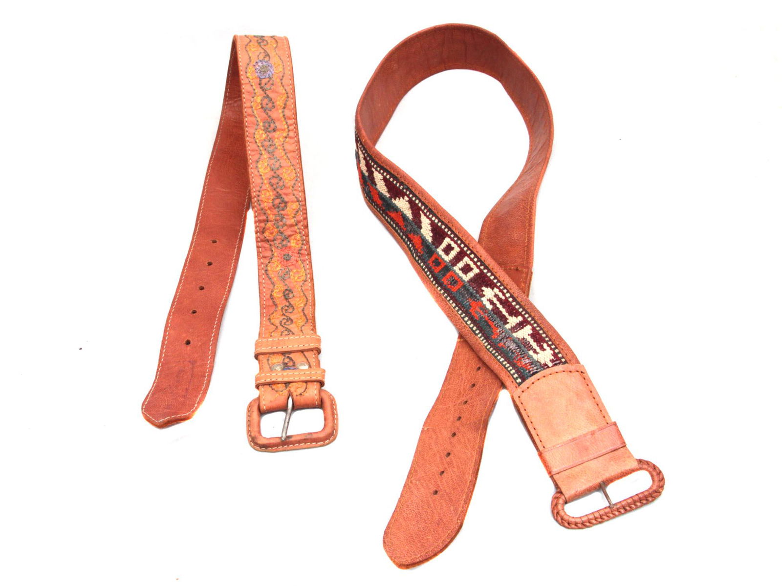 Set of 2 Vintage Leather Belt, Afghanistan: Hand made leather Belt smell still like fresh with embroidery and kilim, Afghanistan Dimensions: Belt: 30" and 40.5"
