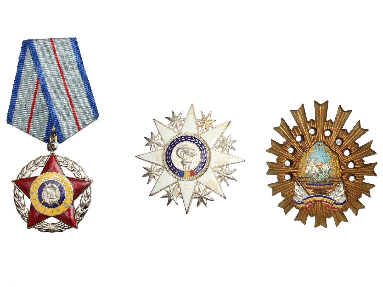 A GROUP OF SOVIET ROMANIAN ORDERS AND DECORATION: 1. Order for Outstanding Service to the State, 3rd class - Order of Securitate, the 1970s-80s. Riveted construction, brass, enamels, and individually set imitation diamonds. Measures 61.2 mm by 52.7 m