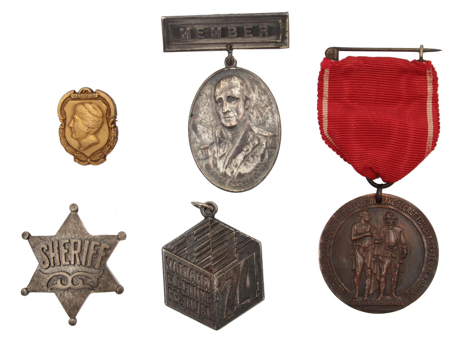 A LOT OF FIVE ASSORTED COMMEMORATIVE MEDALS: This set of badges and medals from diverse institutions includes: Women's Benefit Association golden color anniversary pin. The 22nd Congress Sons of the American Revolution Louisville 1991 member bad