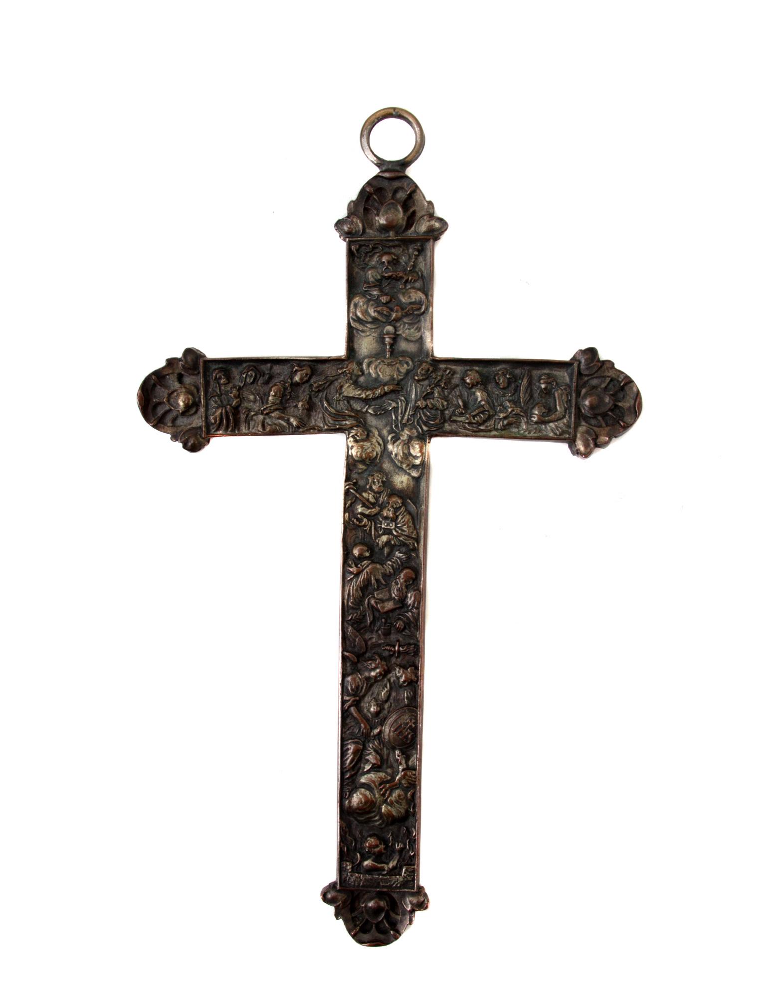 A 17TH CENTURY SILVER REPOUSSE CATHOLIC CROSS: A 17th-century Baroque Crucifix with exquisite details.Weight: 4.4 oz, 124 g. Dimensions: L: 8 1/4 in. (21 cm.)