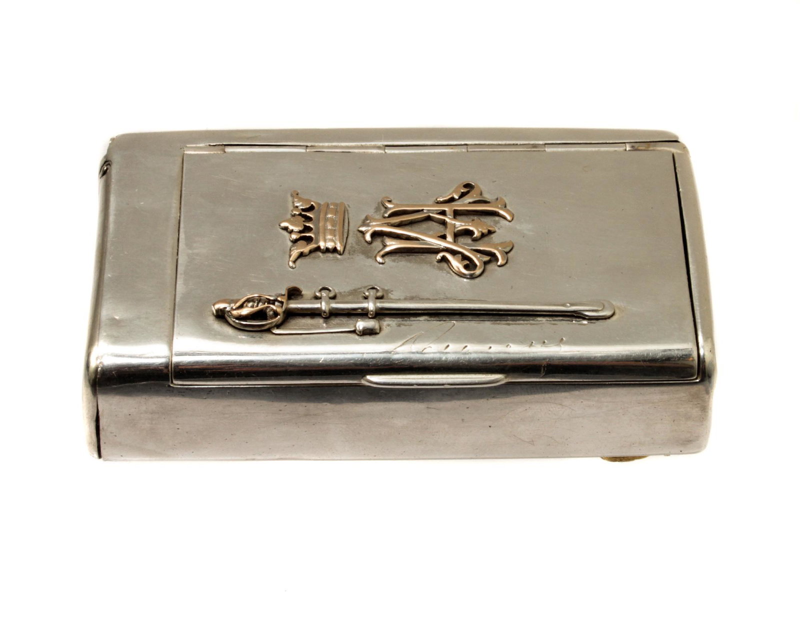 A RUSSIAN GILDED SILVER CIGARETTE CASE CA 1890: An intricately crafted antique silver cigarette case. The lid is decorated with relief gilded overlays with portraits of the Impreter Nicholas II and Empress Alexandra, a horse's head, an imperial eag