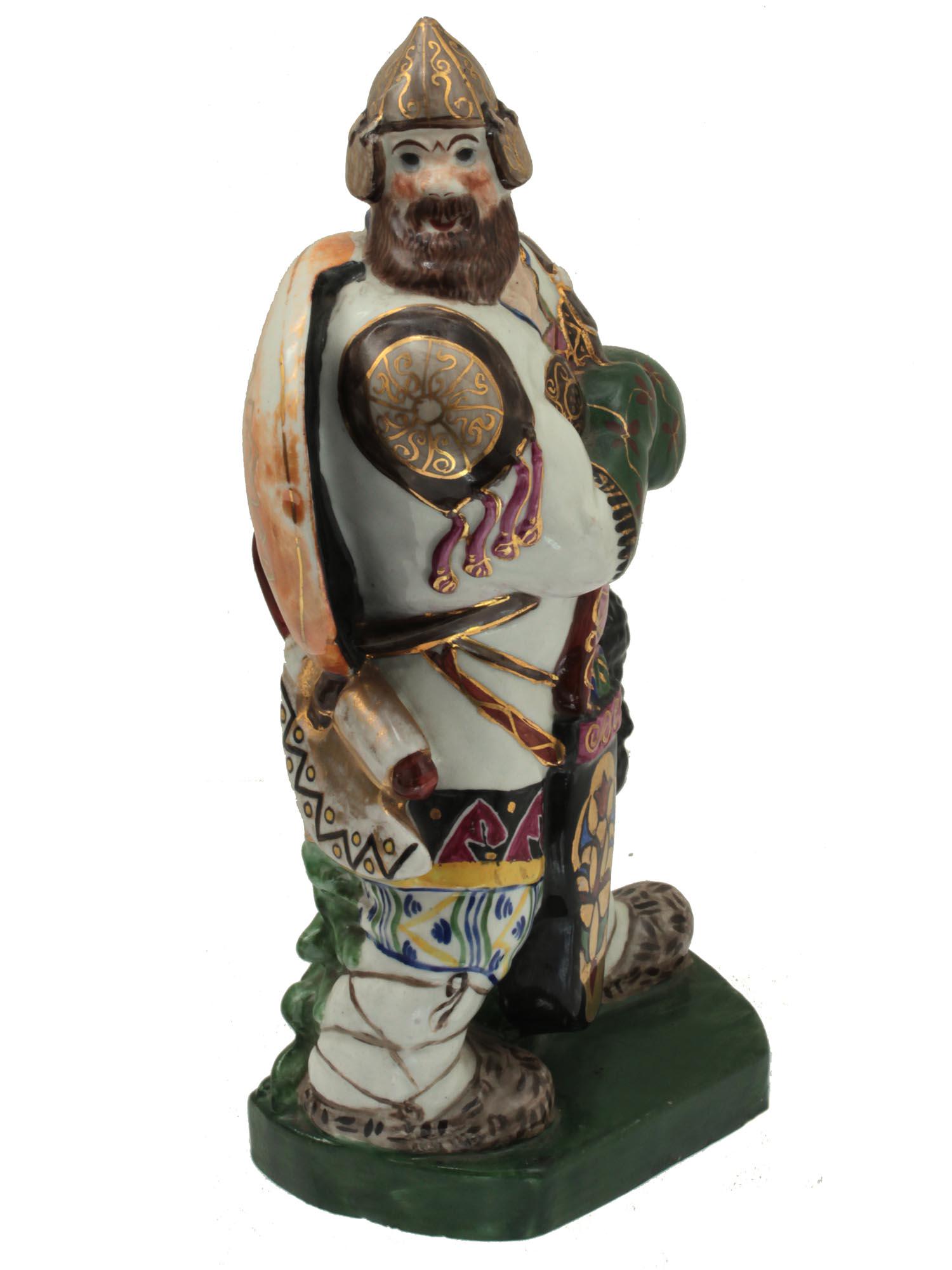 A SOVIET PORCELAIN FIGURE BOOKEND CA 1920S: A massive Russian Soviet porcelain figure bookend "Bogatyr". Made by the Gzhel Factory circa 1920. After the model created in 1910 by the sculptor Boris Lange (1888-1969, Moscow). The figurine is neat