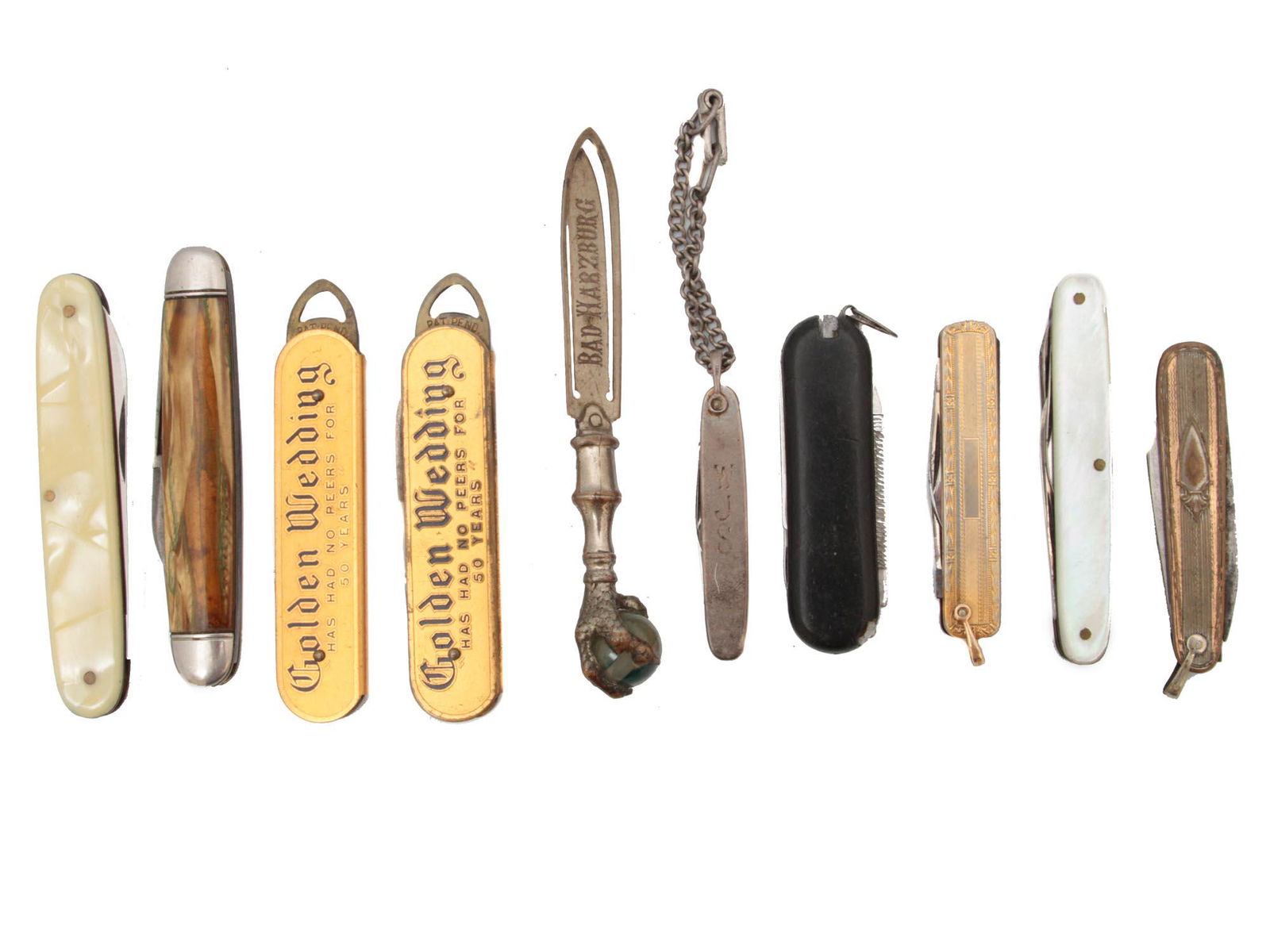 A LOT OF TEN VINTAGE POCKET KNIVES: This lot includes: a two-blade pocket knife made by Hammer Company, USA. A pocket knife with bottle opener by Golden Wedding Whiskey Company, a very rare German pocket knife with mother of pearl handl
