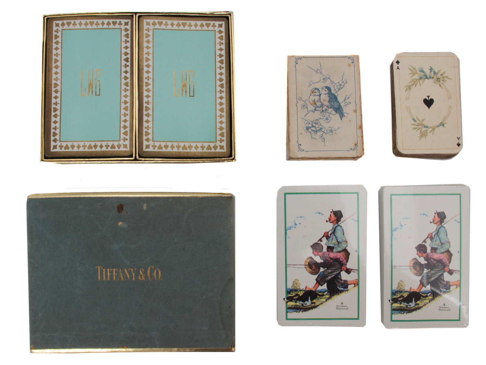 A LOT OF FOUR VINTAGE PLAYING CARD: This lot includes a fine deck of playing cards made by Tiffany & Co., two decks of Trump playing cards made in the USA., and miniature playing cards No. 163 by Patience Karten, Frankfurt, Germany. Cir
