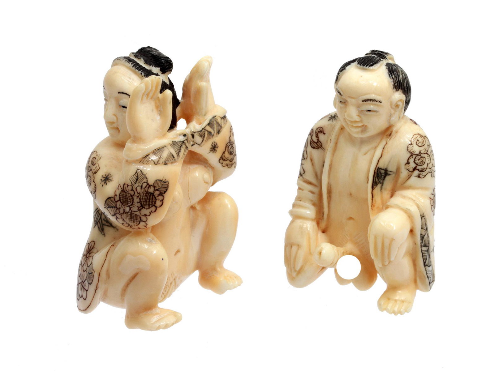 A SIGNED JAPANESE EROTIC NETSUKE SET, 19TH C.: A signed Shunga Netsuke in its perfect original condition. Dimensions: L: 2 1/8 in. (5.4 cm.)