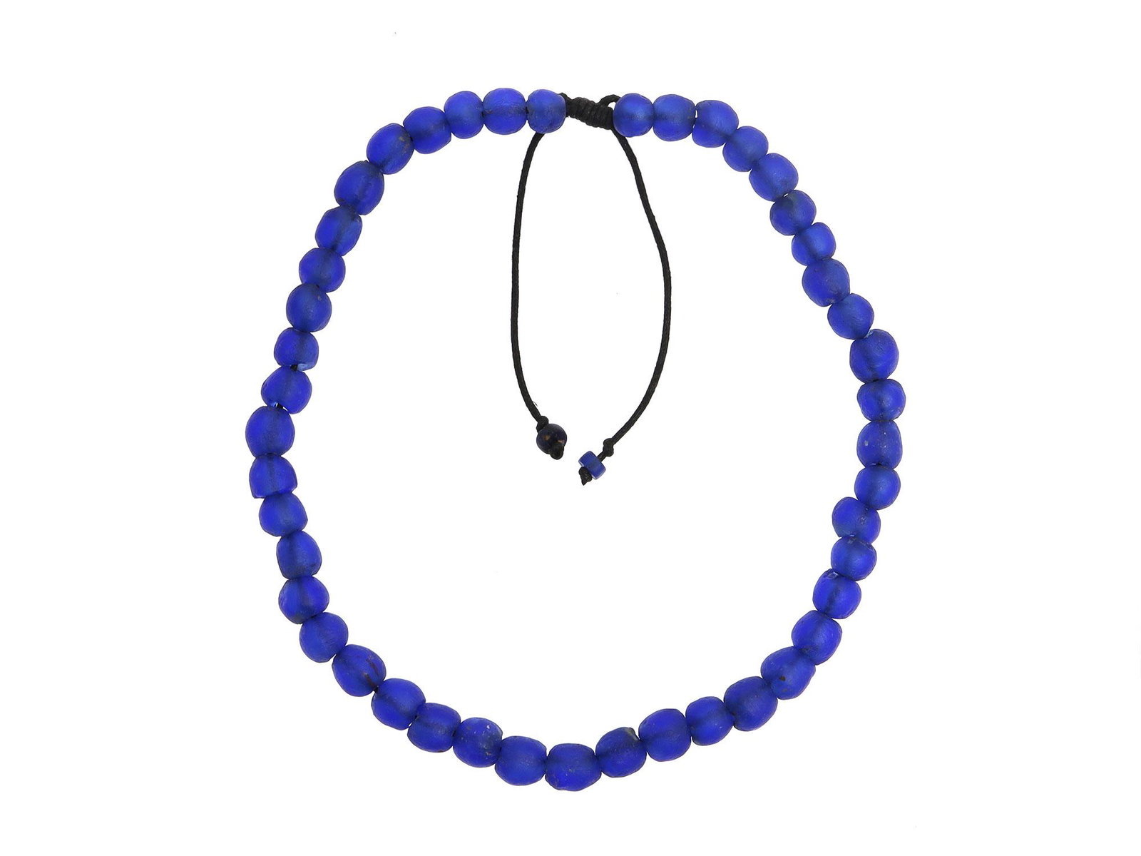 AFRICAN TRADE GLASS BEADS NECKLACE, CA. 1600 A.D.: Composed of spherical shaped royal blue glass beads, strung with adjustable cord closure. Dimensions: 22 in. - 30 in.