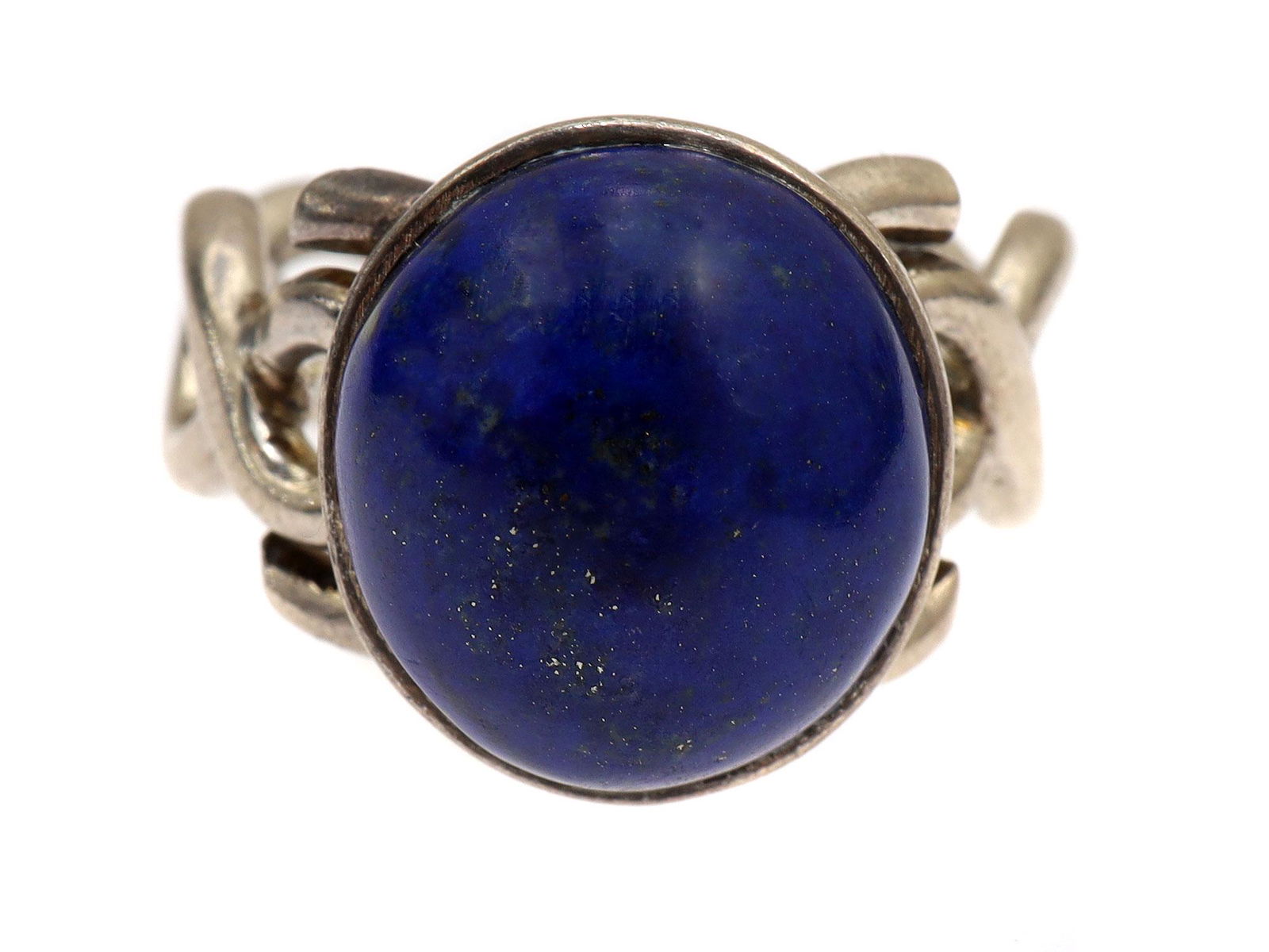 A STERLING SILVER LAPIS LAZULI RING, AFGHANISTAN.: Decorated high quality sterling silver lapis ring.Weight: 0.31146 oz., 8.83 gr. Dimensions: US: 8 Ring Size