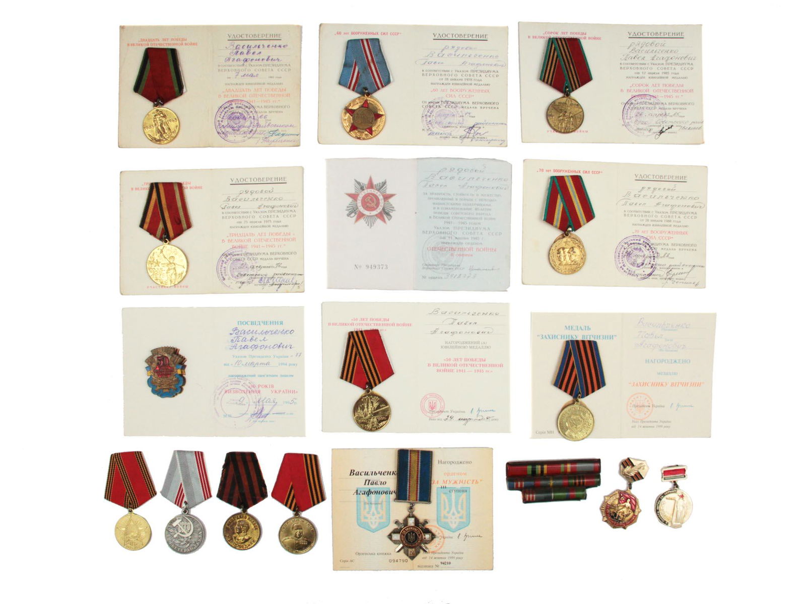 A LARGE LOT OF SOVIET AND UKRAINIAN AWARDS: This lot includes: medals "Twenty Years of Victory in the Great Patriotic War 1941â€“1945," "50 Years of the Armed Forces of the USSR," "Forty Years of Victory in the Great Patriotic War 1941â��