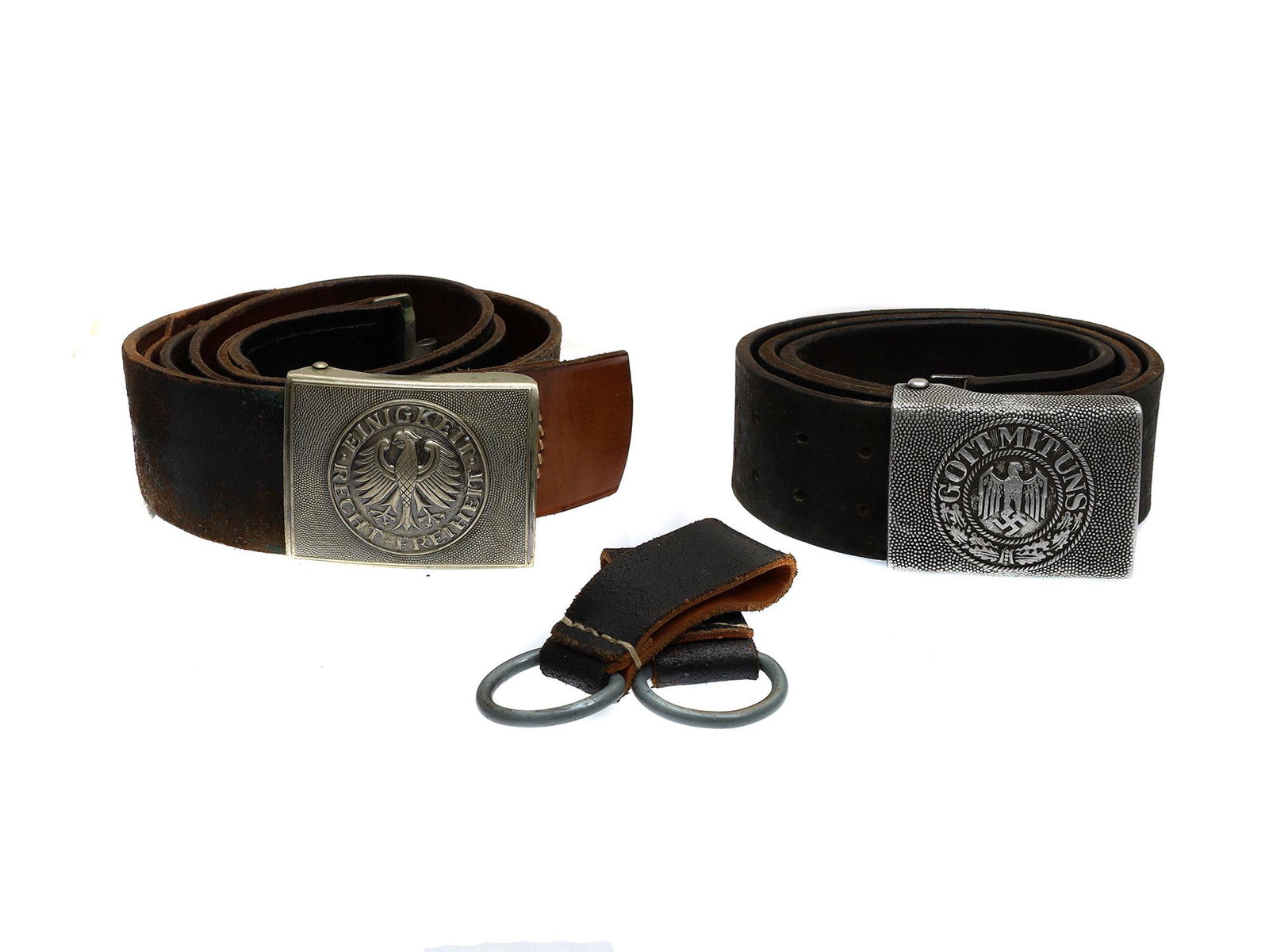 A LOT OF TWO GERMAN WWII BELTS WITH BUCKLES: Lot includes: two vintage WWII German belts. First Bundeswehr belt with buckle, and second Wehrmacht (Army) belt with buckle. Dimensions: Smaller: 38 1/4 in.Larger: 48 1/4 in.