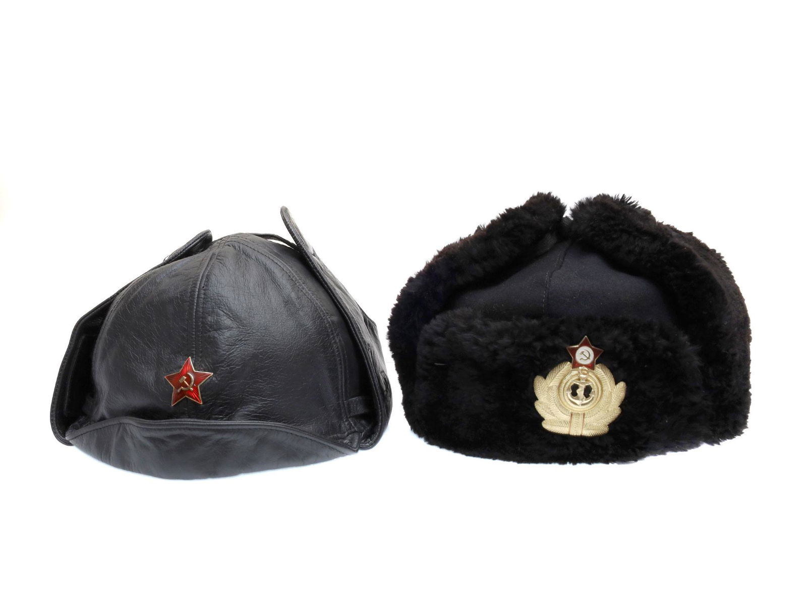 A LOT OF TWO VINTAGE RUSSIAN SOVIET MILITARY HATS: Lot includes a Soviet Pilot's leather cap and an early postwar period Soviet Naval Officer's Ushanka. Dimensions: Fur hat size: 56 Leather hat: No size.