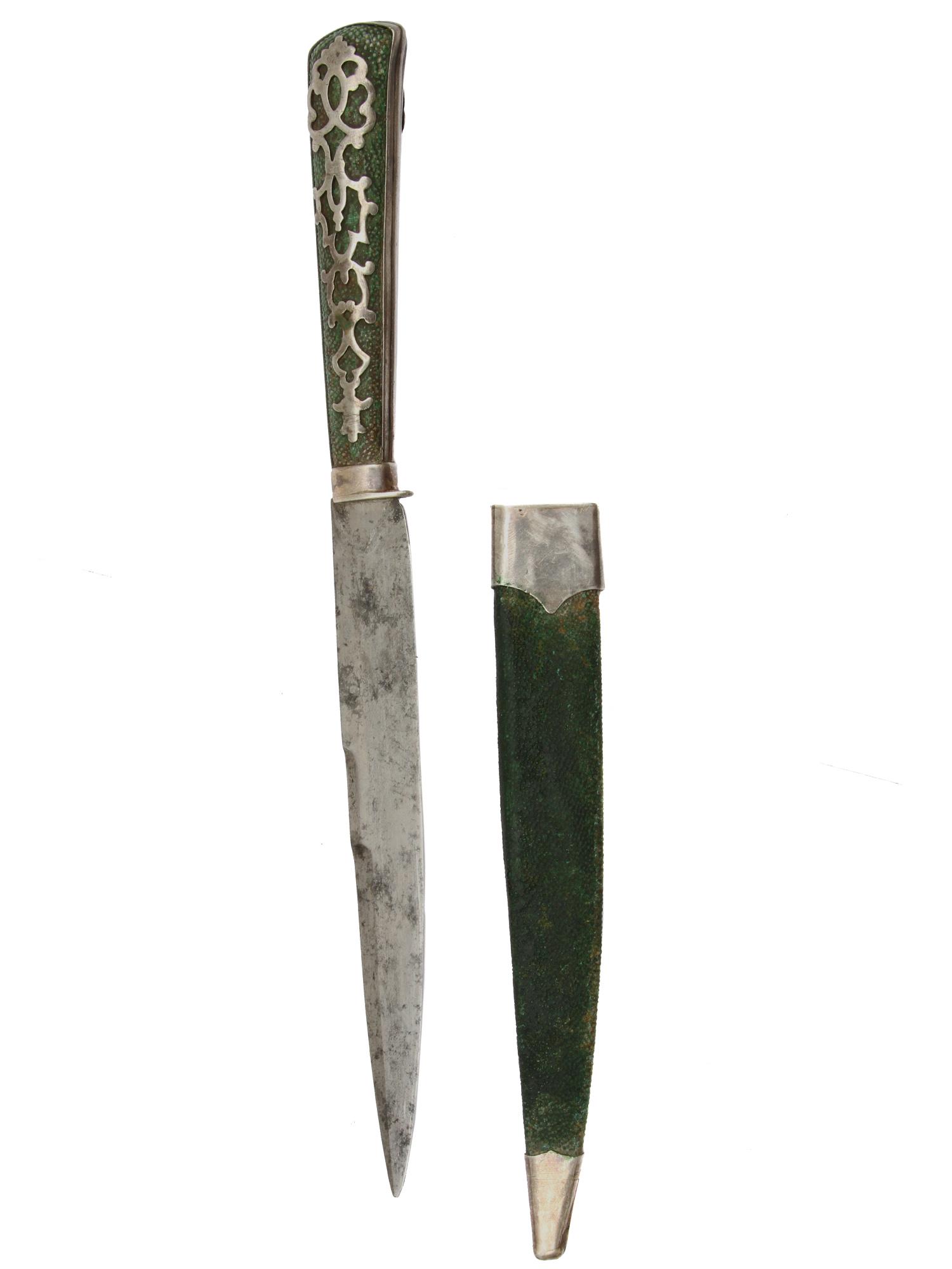 A EUROPEEN SILVER-MOUNTED KNIFE DAGGER, 19TH C.: A silver-mounted dagger with a double-edged blade tip, silver-mounted handle covered with dyed green shagreen leather, wooden scabbard covered in dyed green leather with silver throat and chape.Ca. la