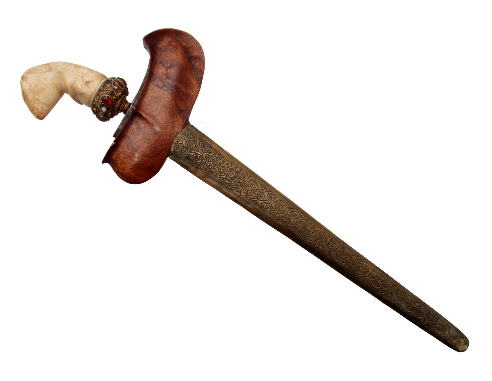 A SUMATRIAN KRIS DAGGER SET WITH GEMS, 19TH CEN.: "Nice kris, with a characteristic Sumatra style. Handle carved out of tridacna seashell, Javanese style mendak, chased brass-mounted scabbard.Late 19th - early 20th cc." Dimensions: L: 20 in. (50.8 cm