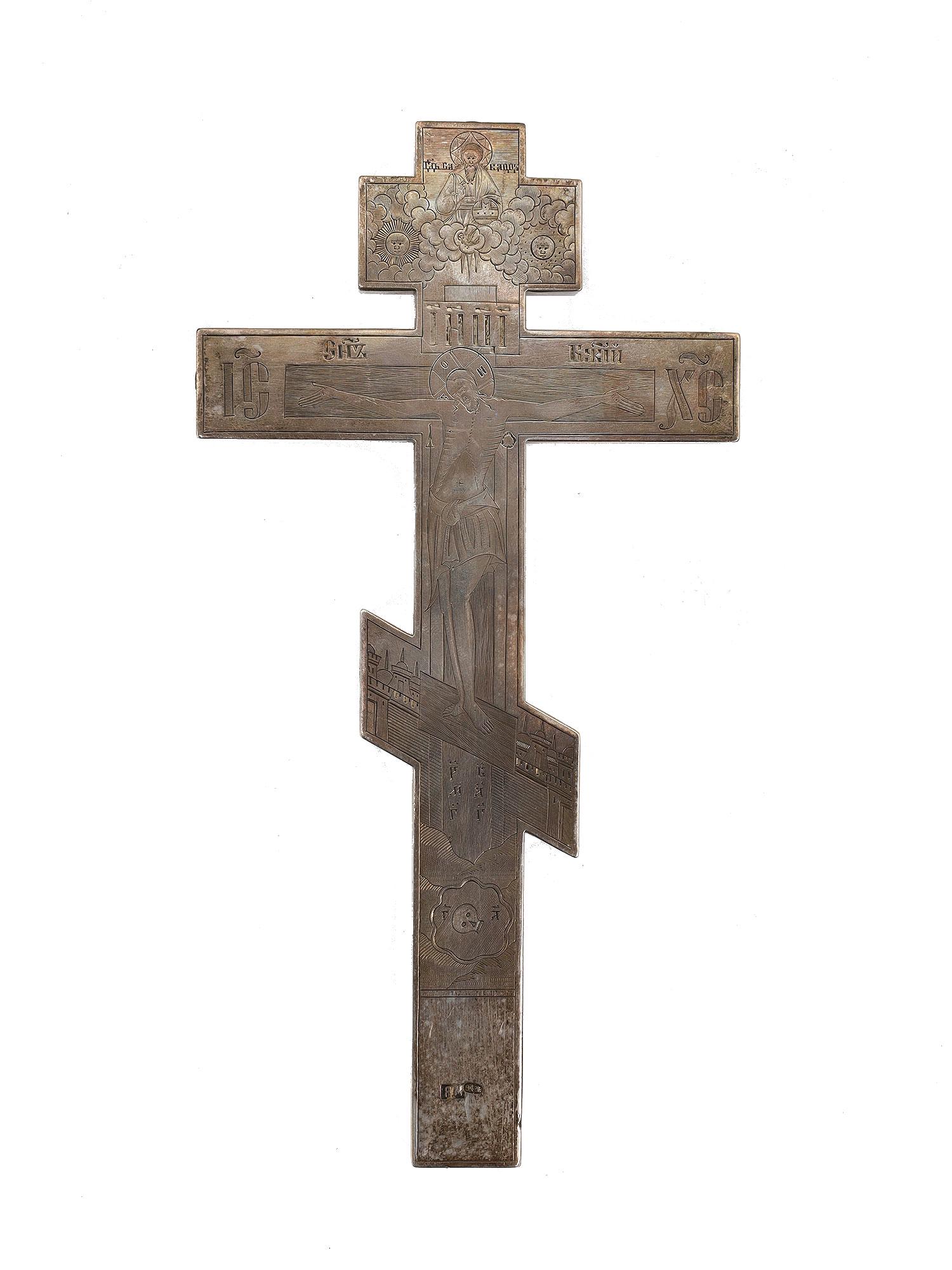 A RUSSIAN ORTHODOX ENGRAVED-SILVER CROSS 1880: A large antique silver Orthodox altar cross with engraving. On the reverse, there is an engraved text in Old Church Slavonic. Hallmarks: 84 silver standard mark next to the image of St. George the Vic