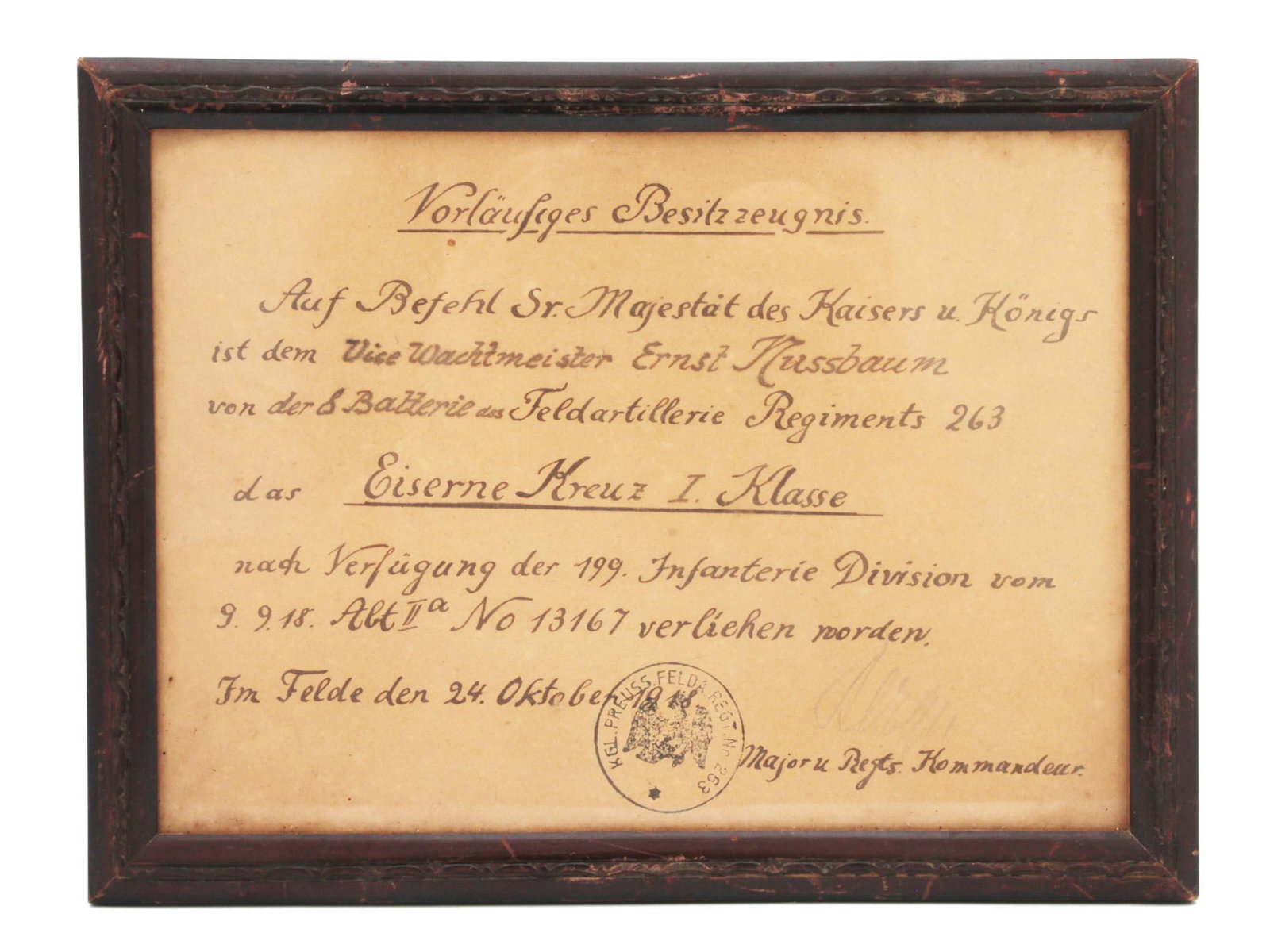 AN ANTIQUE PRUSSIAN DOCUMENT 1918: An original antique Prussian document on the awarding of the Iron Cross 1st degree to Sergeant Ernst Nussbaum. October 24, 1918. The document is filled in ink by hand, framed. Dimensions: 9 1/4 x 7 in