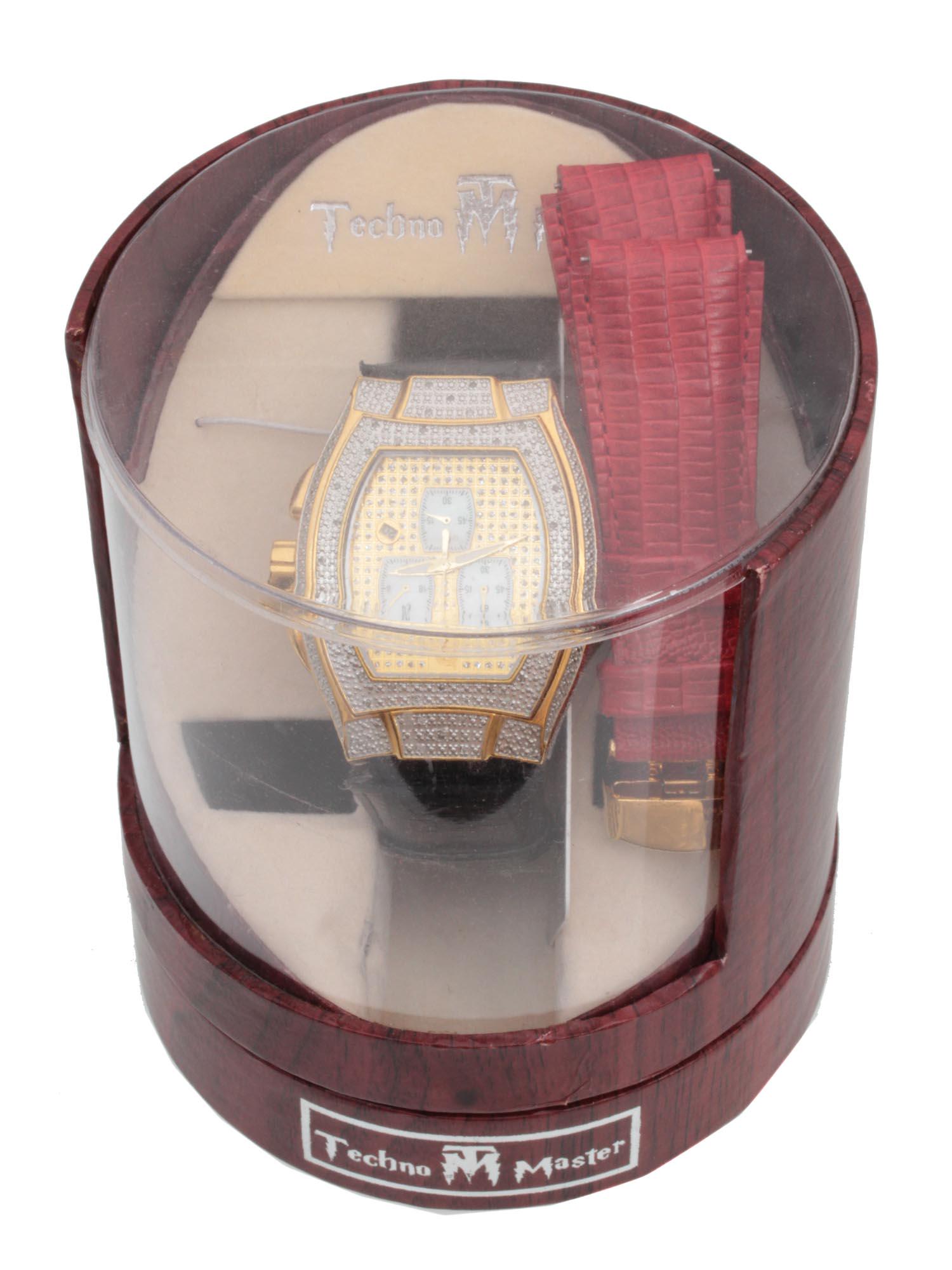 A TECHNO MASTER CHRONOGRAPH WRIST WATCH: This is an authentic stainless steel professional chronograph watch, made by Techno Master, Water-Resistant with Japanese movement, featuring a golden and silver-tone bezel with a black genuine leathe
