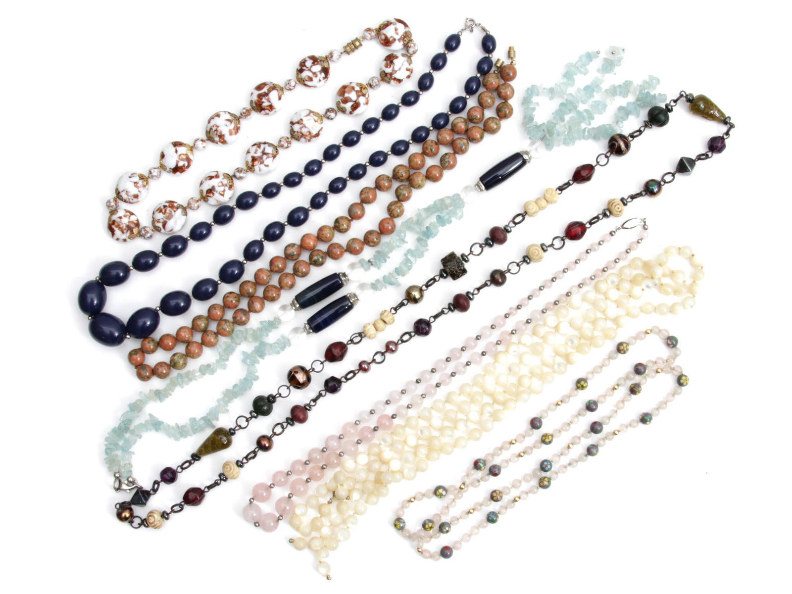 A VINTAGE CUSTOM JEWELRY NECKLACE LUCITE QUARTZ: A lot of custom jewelry items. Included: jasper large bead necklace, blue lucite bead necklace, jade bead necklace, rose quartz bead necklace, clear glass and Murano glass beads necklace, large mother