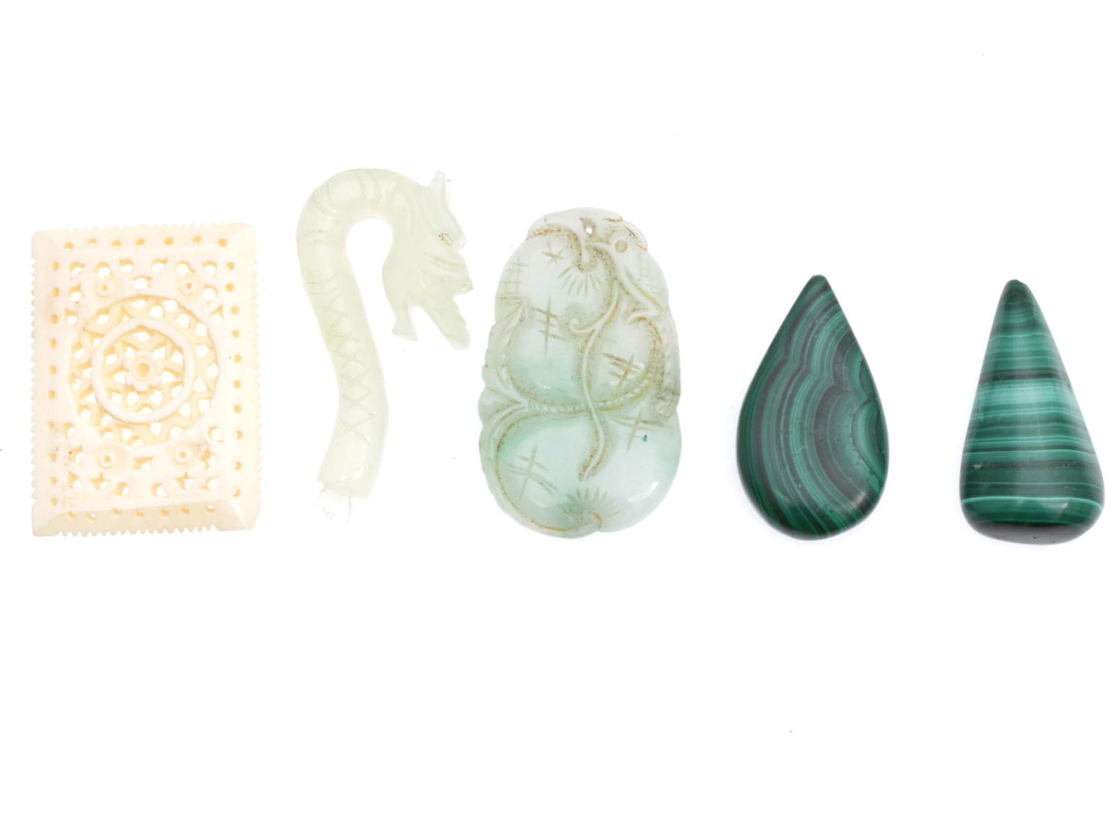 A LOT OF ANTIQUE AND VINTAGE CHINESE PANDANTS: A lot of five antique and vintage Chinese pendants. Included: two malachite, two jade, and one carved bone pendant. Dimensions: Smallest H: 1 3/8 in. Largest H: 1 3/4 in.