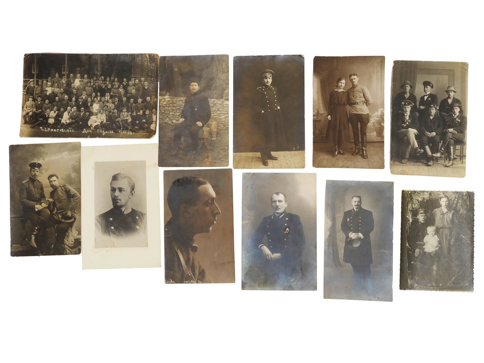 AN ANTIQUE RUSSIAN PHOTOGRAPHS CABINET CARDS: A set of eleven Russian vintage black and white photographs of men and women contain portrait photos of Russian military men, family photos, and one group photo with plenty of people, with the inscrip