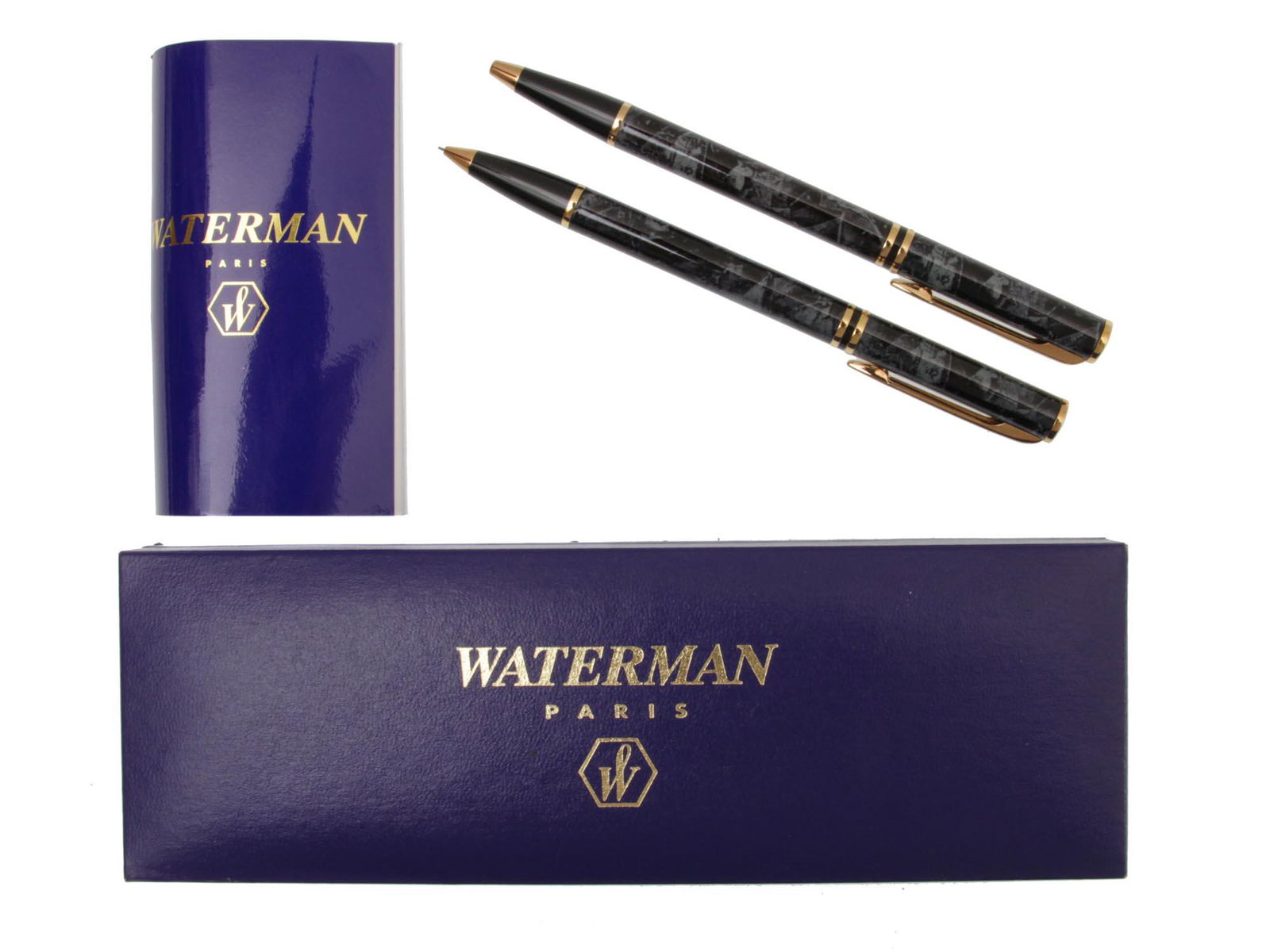 A WATERMAN PARIS BALLPOINT PEN AND PENCIL SET: A set of a ballpoint pen and a mechanical pencil in a Waterman Paris blue branded box. Pen and pencil are decorated with a lacquered finish imitating gray marble with gold plated trim. Dimensions: L: