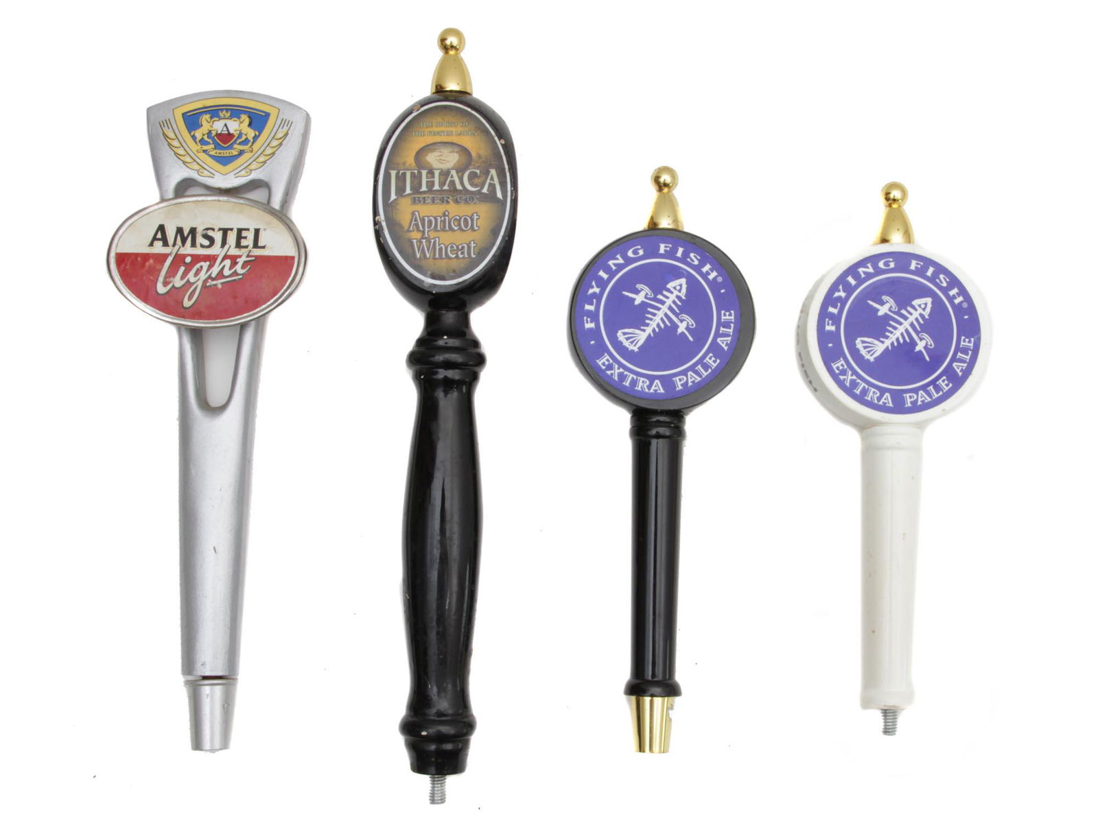 FOUR VINTAGE MOUNTED BEER TAP HANDLES: The lot includes:1. Amstel Light Beer Tap Handle;2. Ithaca Beer Co. Apricot Wheat Beer Tap Handle;3. Flying Fish Extra Pale Ale Tap Handle (Black color); 4. Flying Fish Extra Pale Ale Tap Handle (Whit