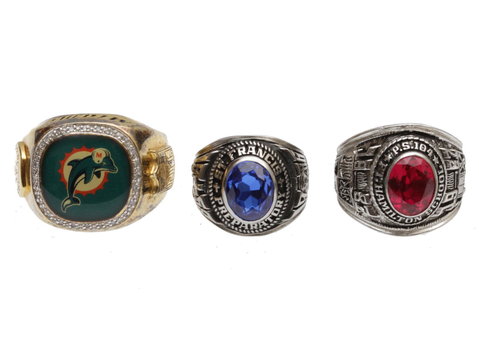 A LOT OF THREE VINTAGE SILVER GRADUATION RINGS: Lot includes a vintage Miami Dolphins ring with 925 silver mark, one Saint Francis Preparatory School class silver ring and the last one is a Ft. Hamilton school graduation ring marked sterling silver