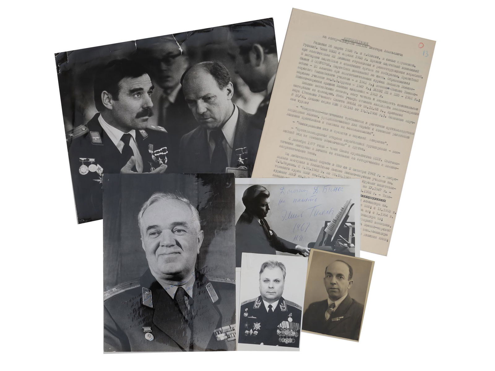 A SET OF VINTAGE SOVIET PHOTOGRAPHS AND DOCUMENTS: A photograph of the pianist Emil Gilels signed for David Bines, a photograph of Rear Admiral Viktor Dygalo and his autobiography, and three photographs of other famous personalities, one of which is a