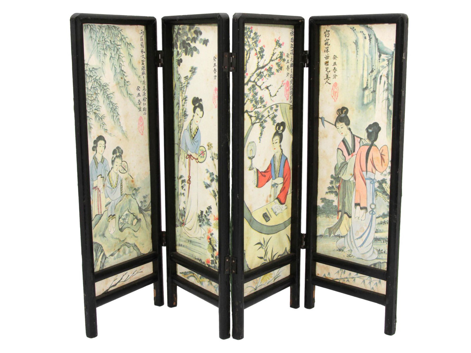 A VINTAGE CHINESE FOUR PANEL TABLE SCREEN: An elegant Chinese table screen made of 4 paper panels. The panels are hand-painted with images of young women walking in nature. There are inscriptions in Chinese and red stamps. Black wooden frame,