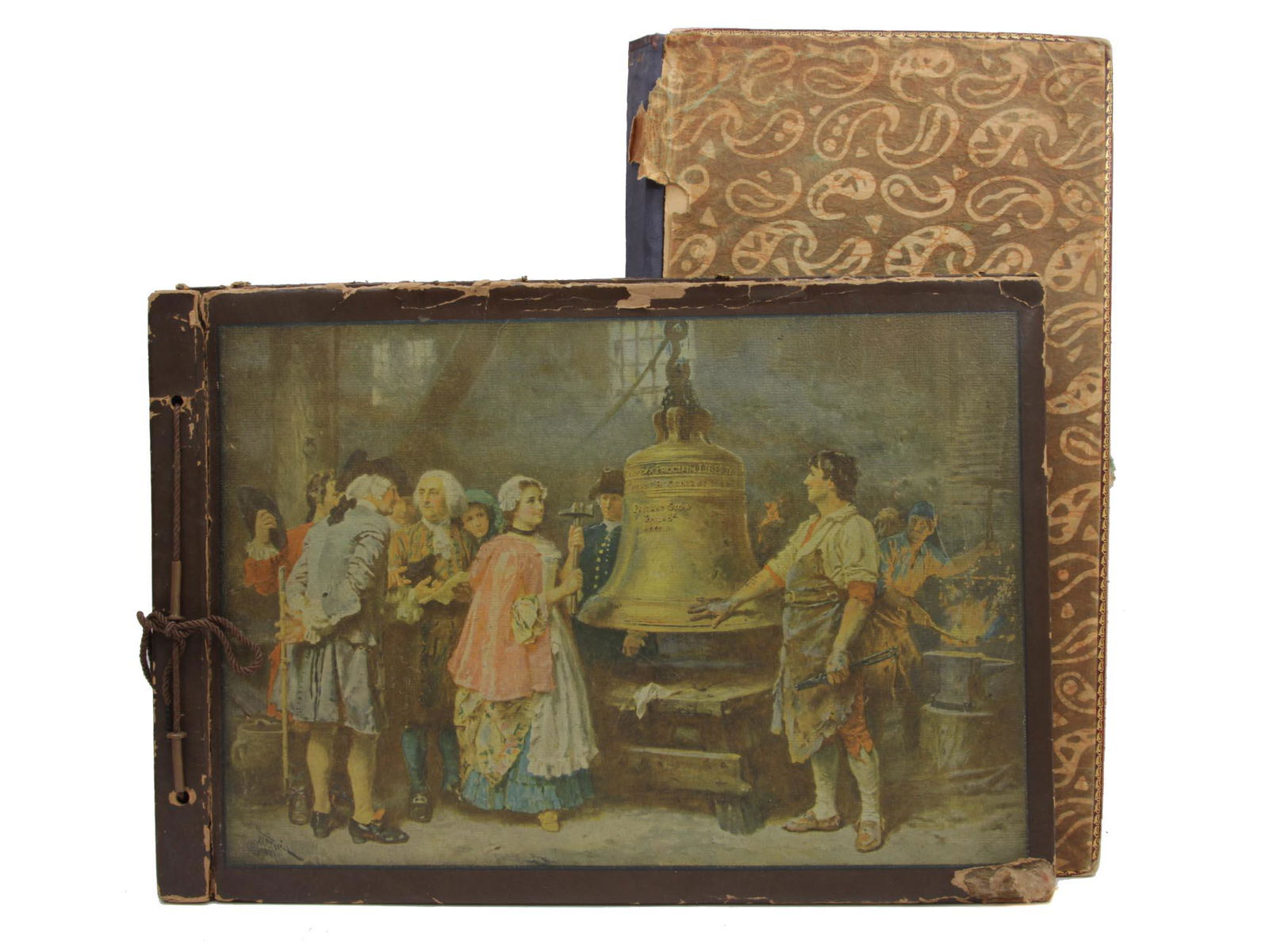 A VINTAGE PHOTO ALBUM AND A POSTCARDS SET: The cover of the photo album is decorated with an image of "The Bell's First Note" by Jean Leon Gerome Ferris. Inside contains information about the painting and the Liberty Bell. The pages of the pho