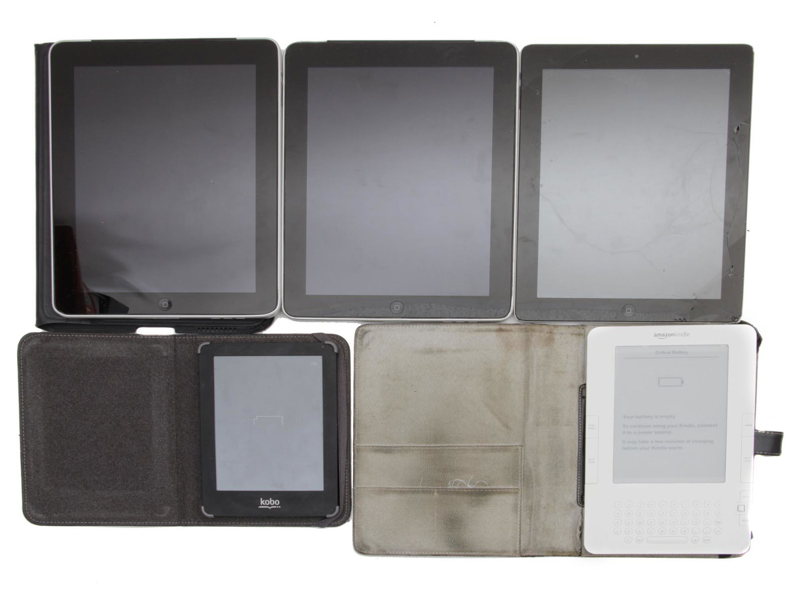 A LOT OF APPLE IPAD AMAZON KINDLE KOBO EBOOK: A lot of five gadgets: tablets, and eBooks devises, include two Apple tablet, designed in California, assembled in China, from rare 1st generation Model A 1337 on 64GB and 32GB, Apple tablet from 3rd