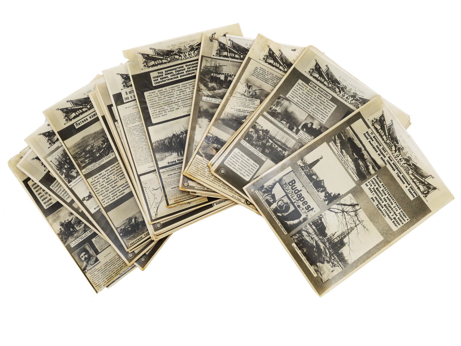 A SET OF 16 RUSSIAN SOVIET PHOTO LEAFLETS: A set of 16 Soviet propaganda photo leaflets describing the key events of the Great Patriotic War. At the top, there is an inscription in Russian: "For our Soviet Motherland" with the dates 1918 and 1