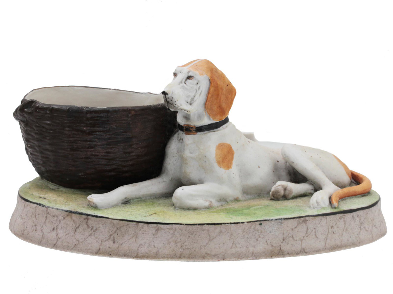 AN ANTIQUE SOVIET PORCELAIN MATCH HOLDER CA 1930S: An antique match strike and holder with a porcelain composition "A Dog with a Basket", made by the Dmitrov Porcelain Factory in Verbilki (formerly the Gardner Factory) after the model of the mid-19th 