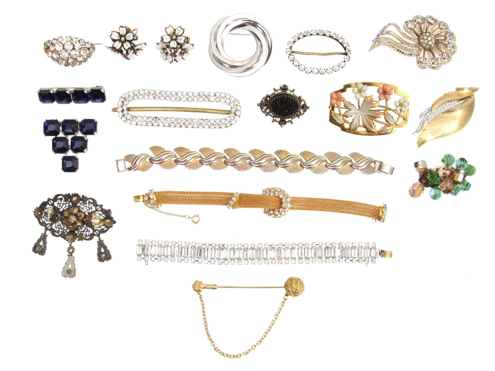 A LOT OF VINTAGE CUSTOM JEWELRY BROOCH BRACELET: A lot of vintage custom jewelry items. Included various brooches, bracelets, and earrings: gold tone and silver tone, with carved metal, with enameled flowers, decorated with crystals and artificial s