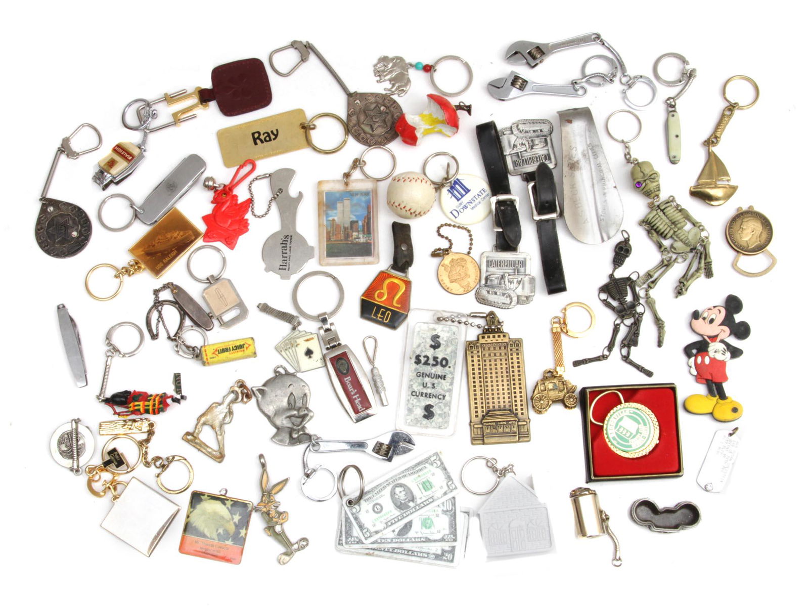 A LOT OF 49 VINTAGE COLLECTIBLE KEYCHAINS: This is a lot of collectible keychains. Included: A pair of Judaica 12 tribes of Israel keychains, a Porky Pig pewter keychain from Warner Bros Co. Model K1495 Looney Tunes,1995. A vintage Mickey Mous