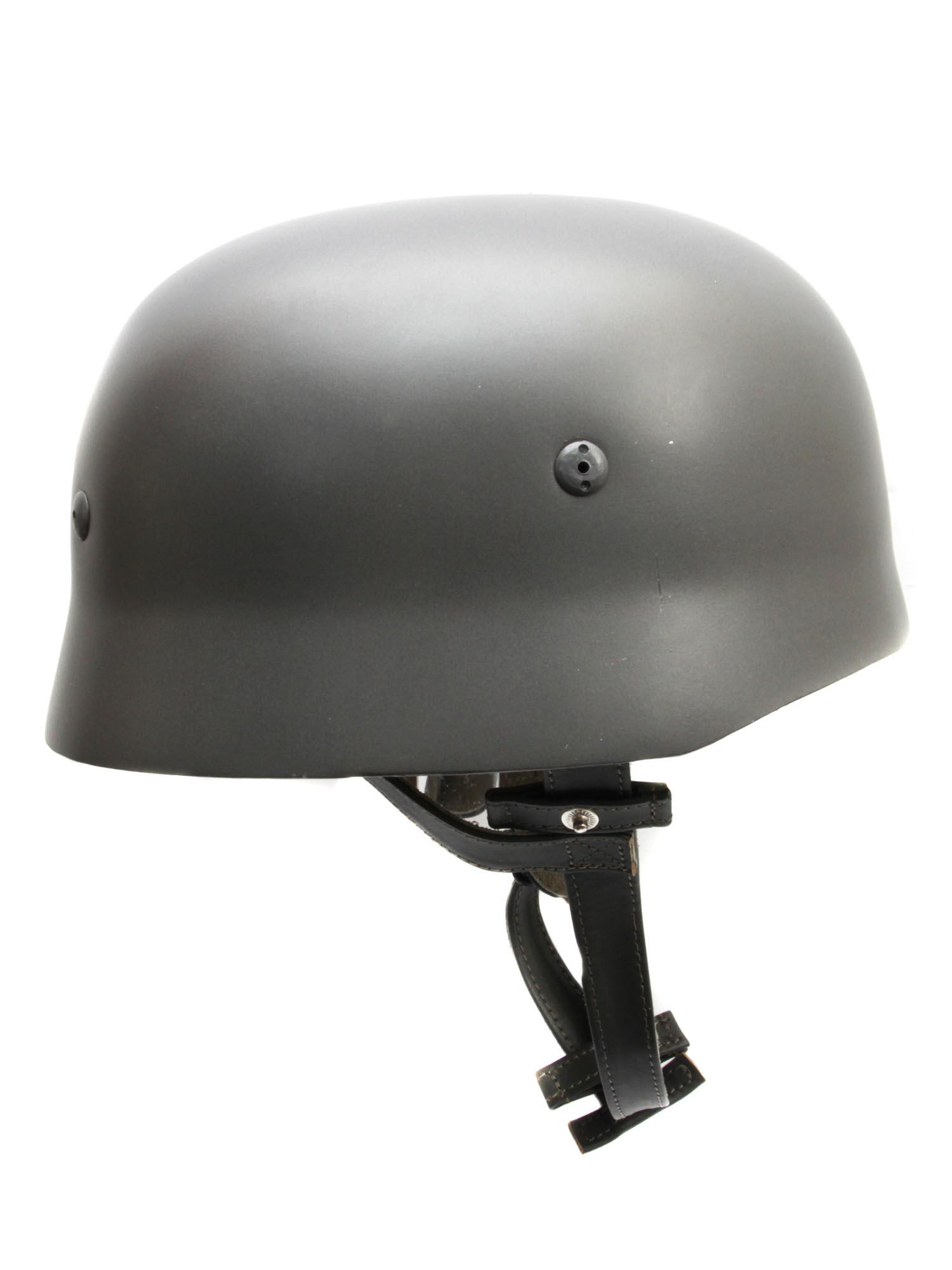A WWII GERMAN PARATROOPER HELMET: A vintage German grey color paratrooper helmet during the Second World War, with leather liner, marked Karl Heisler Berlin C2 DPSM and Kopiweite Gr. 61, Stahihaube Nr. Dimensions: N/A