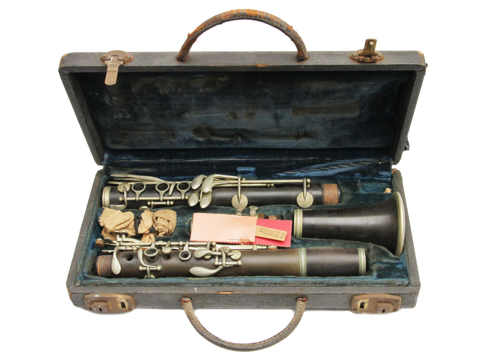 A VINTAGE SELMER CLARINET WITH AN ORIGINAL CASE: A vintage Selmer clarinet in an original hard wooden case with velvet lining. Presumably, German, first half of the 20th century Made in France. Dimensions: L: 27 in.