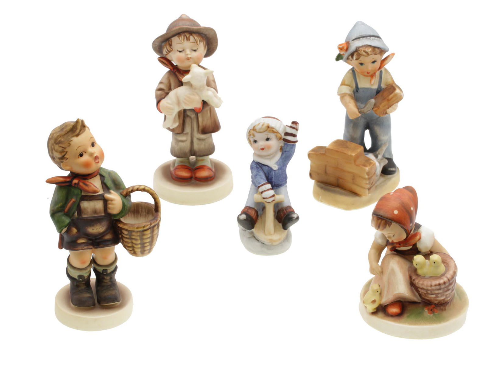 A SET OF VINTAGE HUMMEL GOEBEL PORCELAIN FIGURINE: A set of five vintage porcelain figurines with children. The figurine of a boy with a lamb, a boy with a basket, and a girl with chickens are signed by M.J. Hummel, the other two are made in the same