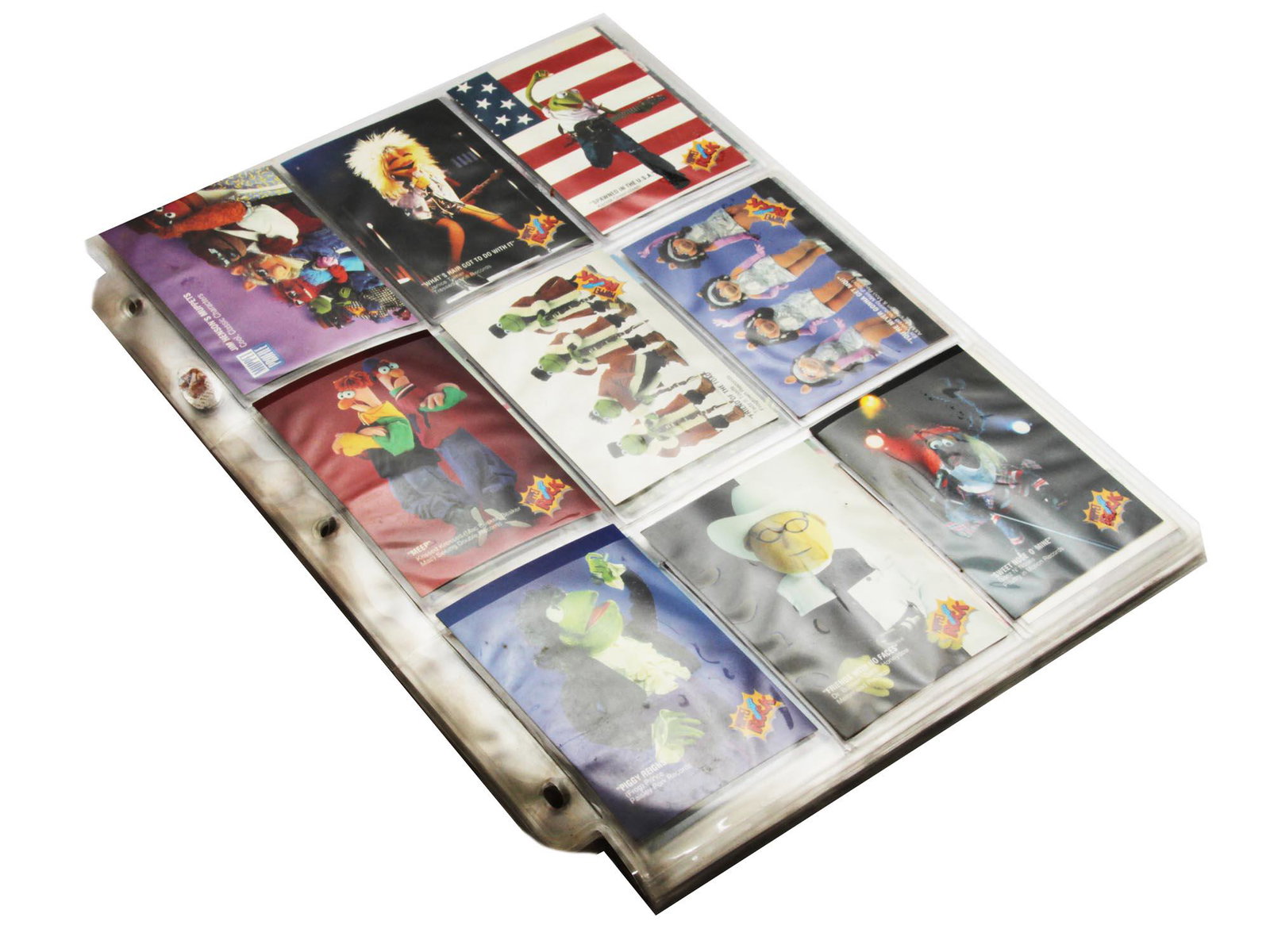 A SET OF VINTAGE COLLECTIBLE CARDS: A set of vintage collectible cards, including the Muppet Hero Cards and Animal Cards. Dimensions: N/A