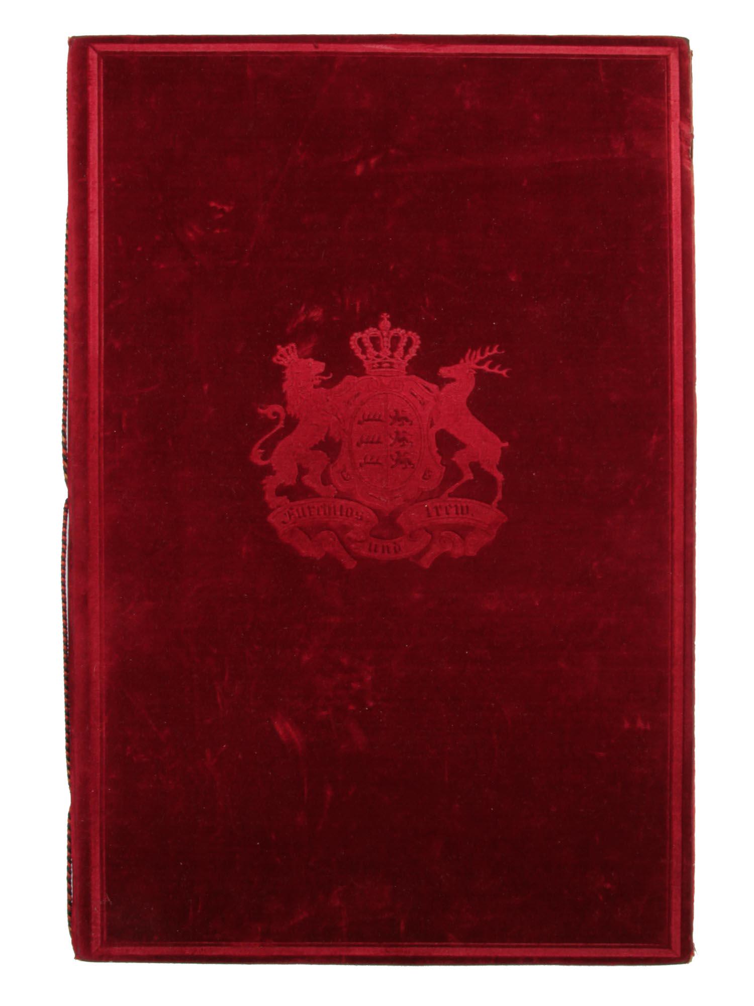 AN ANTIQUE GERMAN IMPERIAL PATENT OF NOBILITY: A Prussian patent of nobility signed by Kaiser Wilhelm II. In a scarlet velvet cover. Circa the late 19th or the early 20th-century. Dimensions: 14 x 9 in.