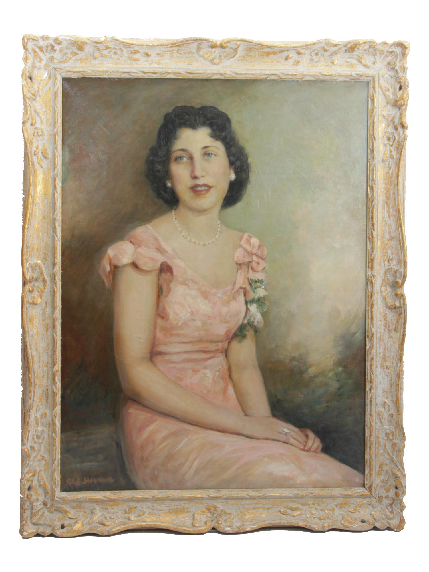 AN ANTIQUE OIL PANTING LADY PORTRAIT IN DRESS: An American early 20th century oil on canvas portrait depicting a beautiful lady with blue eyes in a soft pink dress. Presented in a vintage wooden frame with patina. Signed by the artist, Herman, low